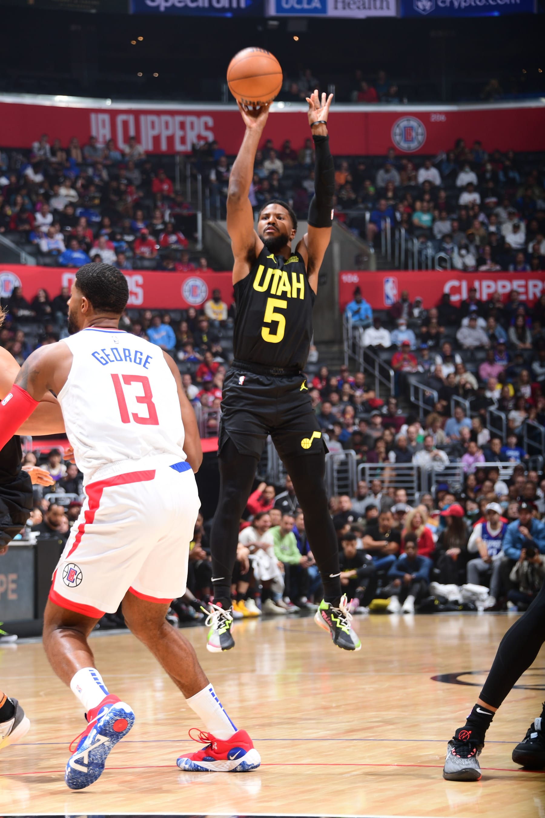 LOS ANGELES, CA - NOVEMBER 6: Malik Beasley #5 of the Utah Jazz shoots a three point basket during the game against the LA Clippers on November 6, 2022 at Crypto.com Arena in Los Angeles, California. NOTE TO USER: User expressly acknowledges and agrees that, by downloading and/or using this Photograph, user is consenting to the terms and conditions of the Getty Images License Agreement. Mandatory Copyright Notice: Copyright 2022 NBAE (Photo by Adam Pantozzi/NBAE via Getty Images)