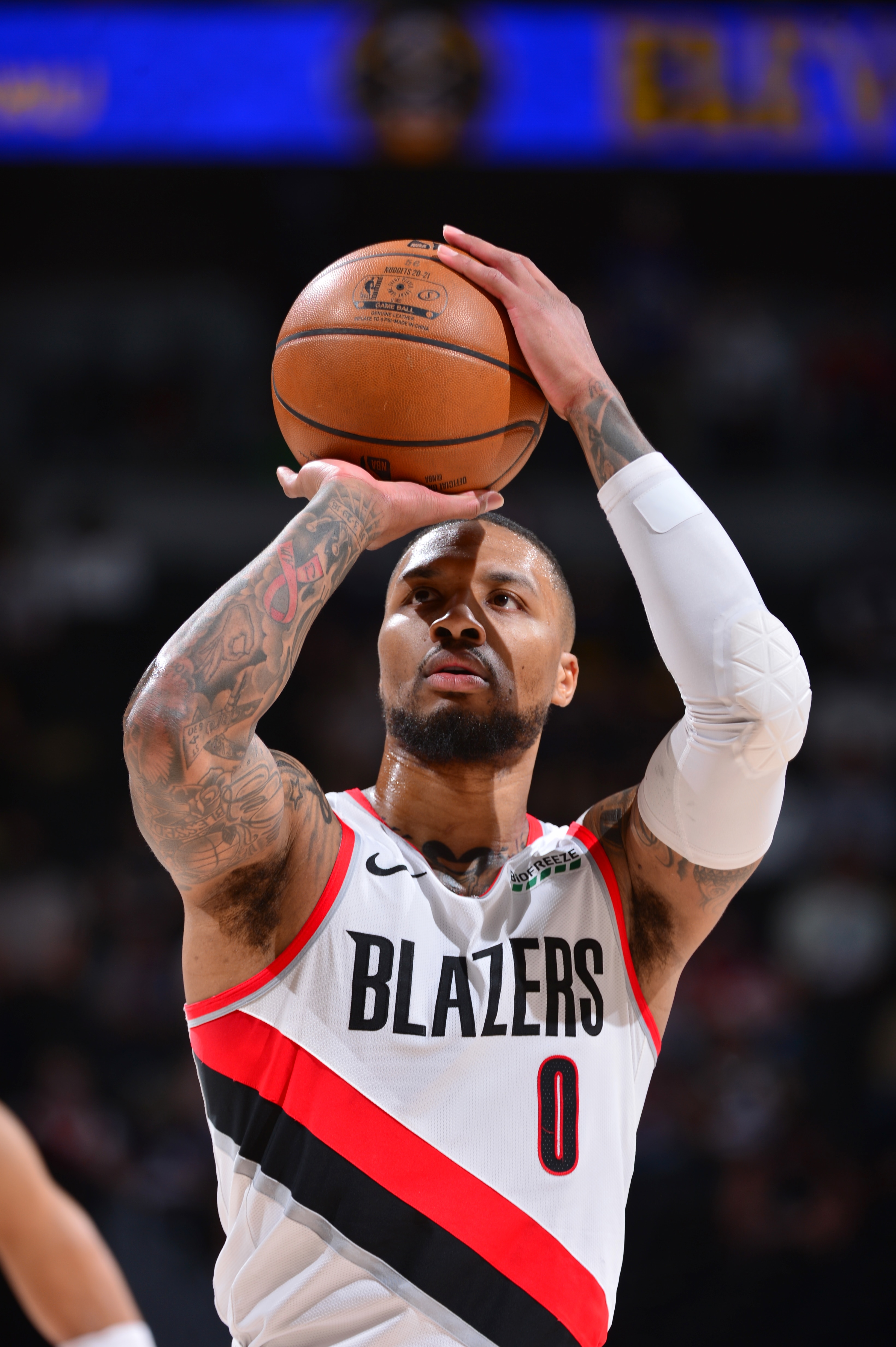 DENVER, CO - MAY 24: Damian Lillard #0 of the Portland Trail Blazers looks on during the game against the Denver Nuggets during Round 2, Game 2 of the 2021 NBA Playoffs on May 24, 2021 at the Ball Arena in Denver, Colorado. NOTE TO USER: User expressly acknowledges and agrees that, by downloading and/or using this Photograph, user is consenting to the terms and conditions of the Getty Images License Agreement. Mandatory Copyright Notice: Copyright 2021 NBAE (Photo by Bart Young/NBAE via Getty Images)