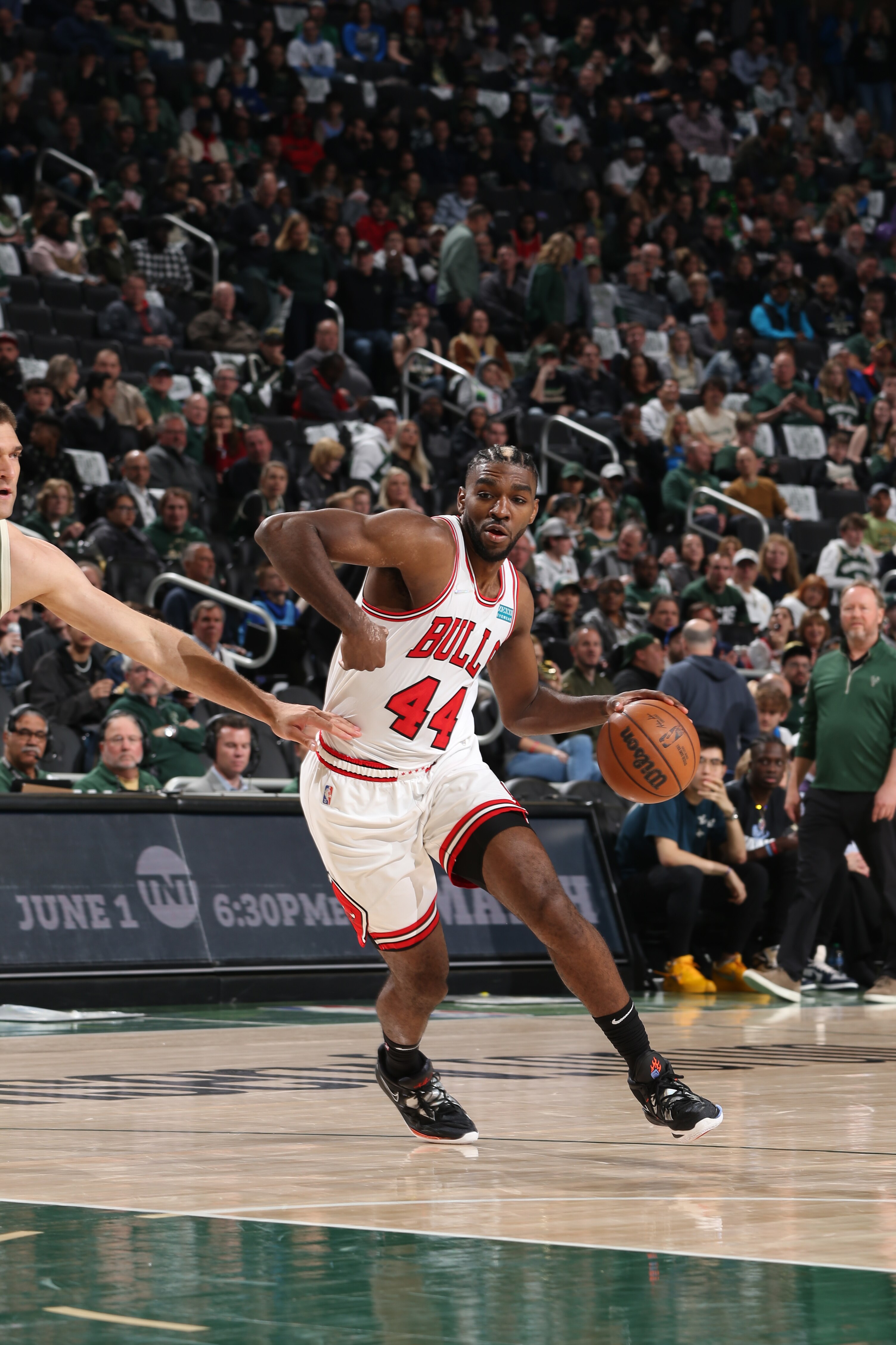 MILWAUKEE, WI - APRIL 27: Patrick Williams #44 of the Chicago Bulls drives to the basket against the Milwaukee Bucks during Round 1 Game 5 of the 2022 NBA Playoffs on April 27, 2022 at the Fiserv Forum Center in Milwaukee, Wisconsin. NOTE TO USER: User expressly acknowledges and agrees that, by downloading and or using this Photograph, user is consenting to the terms and conditions of the Getty Images License Agreement. Mandatory Copyright Notice: Copyright 2022 NBAE (Photo by Gary Dineen/NBAE via Getty Images).