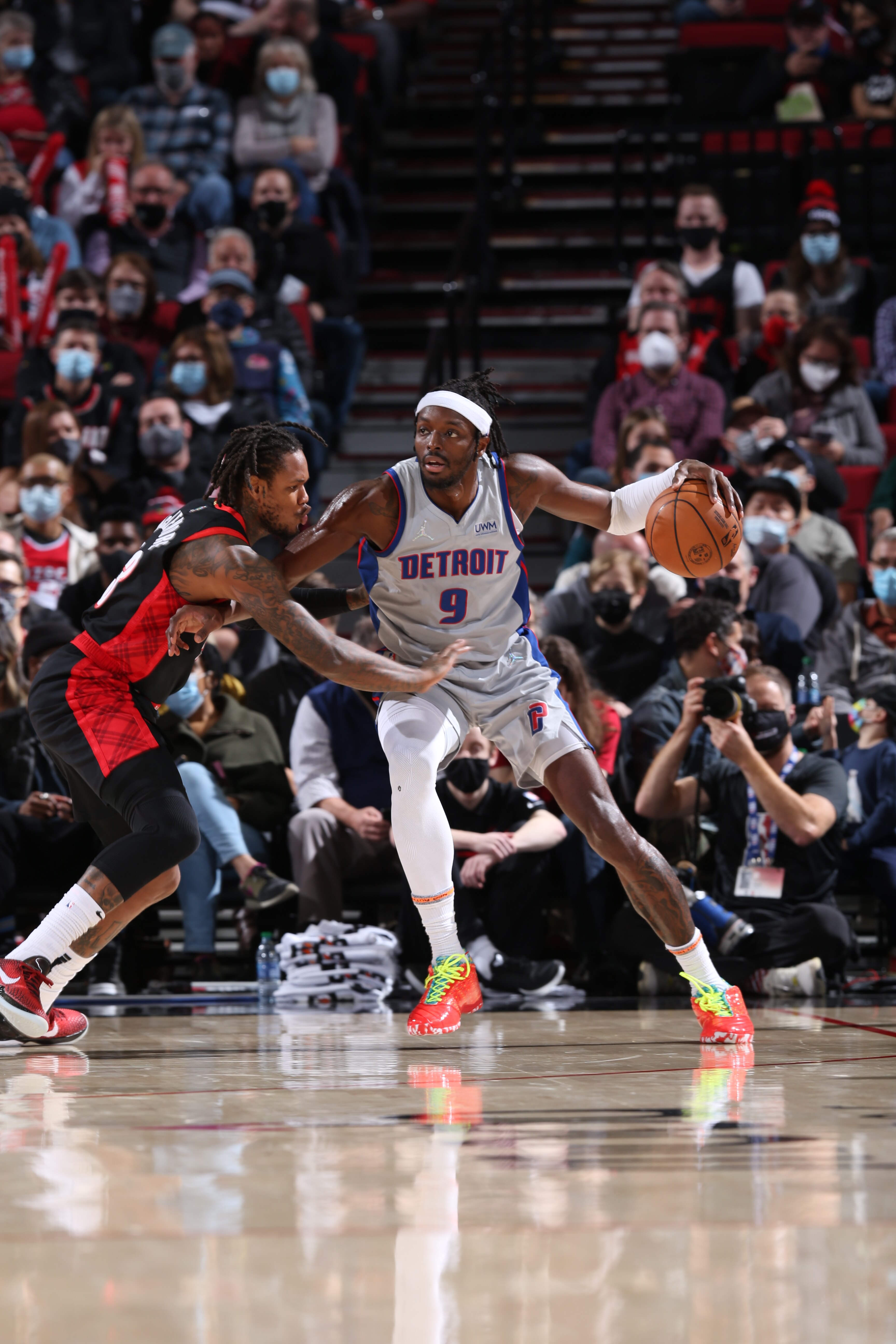 PORTLAND, OR - NOVEMBER 30: Jerami Grant #9 of the Detroit Pistons handles the ball against the Portland Trail Blazers on November 30, 2021at the Moda Center Arena in Portland, Oregon. NOTE TO USER: User expressly acknowledges and agrees that, by downloading and or using this photograph, user is consenting to the terms and conditions of the Getty Images License Agreement. Mandatory Copyright Notice: Copyright 2021 NBAE (Photo by Sam Forencich/NBAE via Getty Images)