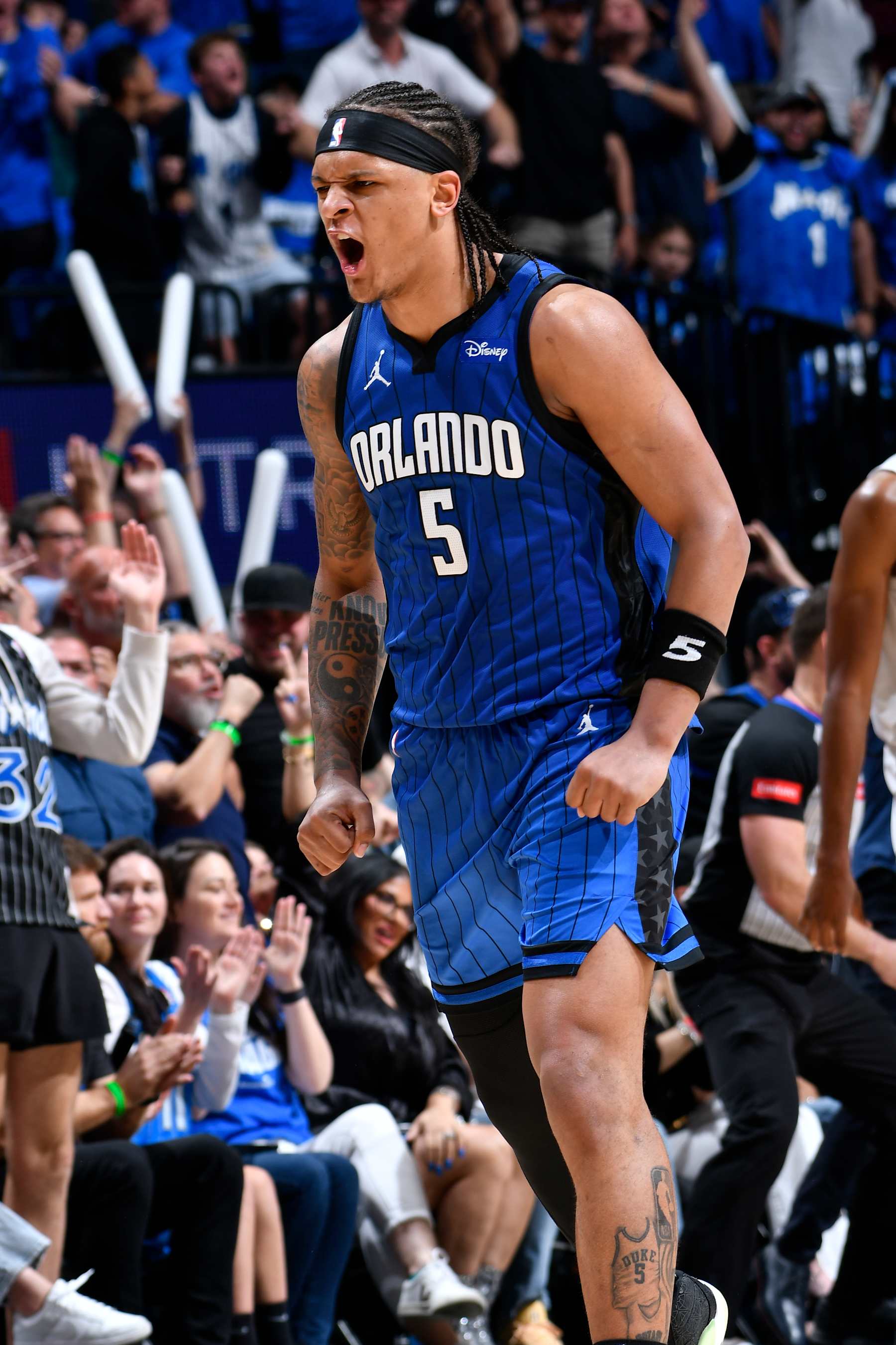 ORLANDO, FL - MAY 3: Paolo Banchero #5 of the Orlando Magic celebrates during the game against the Cleveland Cavaliers during Round 1 Game 6 of the 2024 NBA Playoffs on May 3, 2024 at Amway Center in Orlando, Florida. NOTE TO USER: User expressly acknowledges and agrees that, by downloading and or using this photograph, User is consenting to the terms and conditions of the Getty Images License Agreement. Mandatory Copyright Notice: Copyright 2024 NBAE (Photo by Fernando Medina/NBAE via Getty Images)