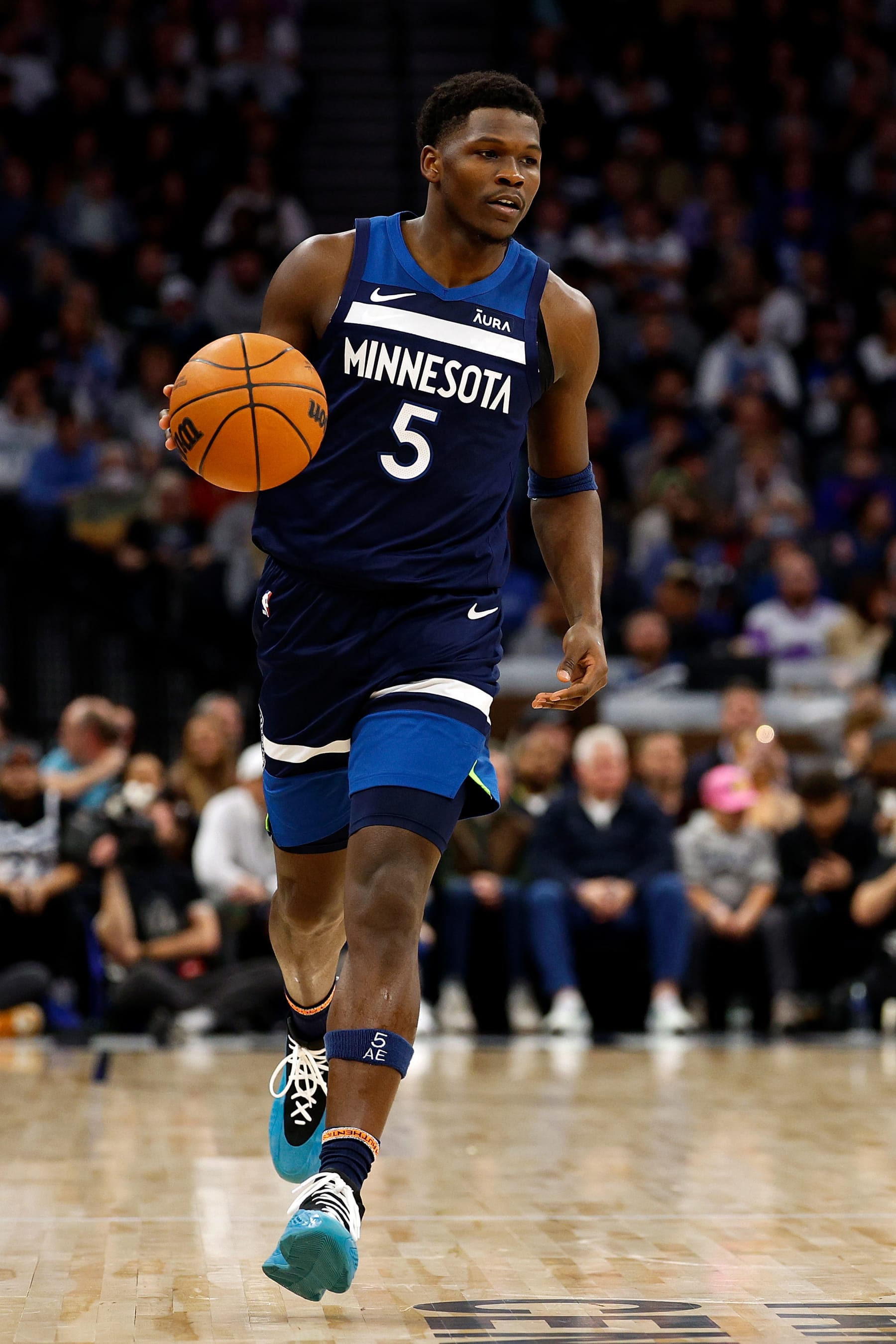 MINNEAPOLIS, MINNESOTA - NOVEMBER 22: Anthony Edwards #5 of the Minnesota Timberwolves dribbles the ball against the Philadelphia 76ers in the second quarter at Target Center on November 22, 2023 in Minneapolis, Minnesota. NOTE TO USER: User expressly acknowledges and agrees that, by downloading and or using this photograph, User is consenting to the terms and conditions of the Getty Images License Agreement. (Photo by David Berding/Getty Images)