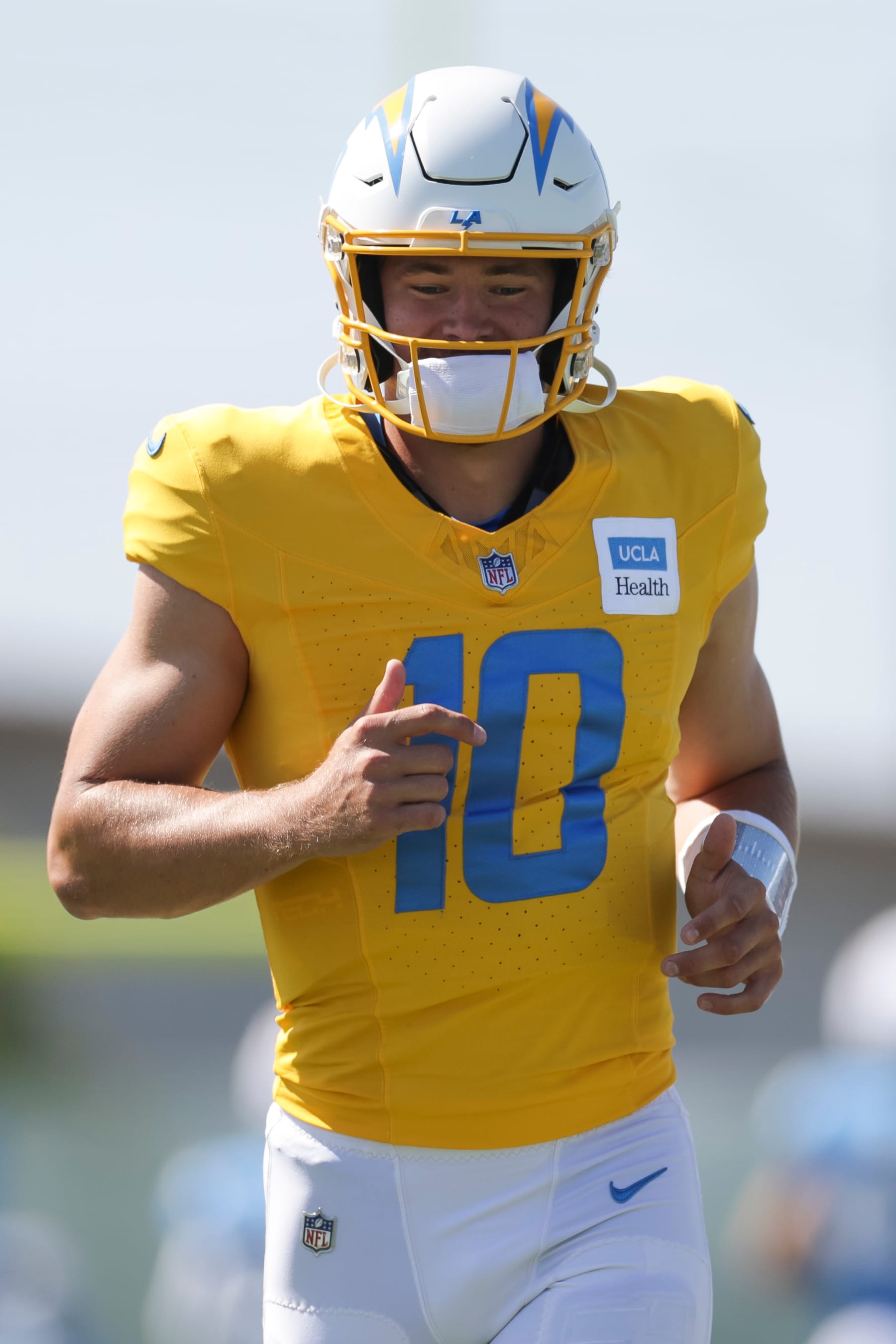 EL SEGUNDO, CA - JULY 29: Los Angeles Chargers quarterback Justin Herbert (10) jogs on the field during the team's training camp at The Bolt on July 29, 2024 in El Segundo, CA. (Photo by Brandon Sloter/Icon Sportswire via Getty Images)