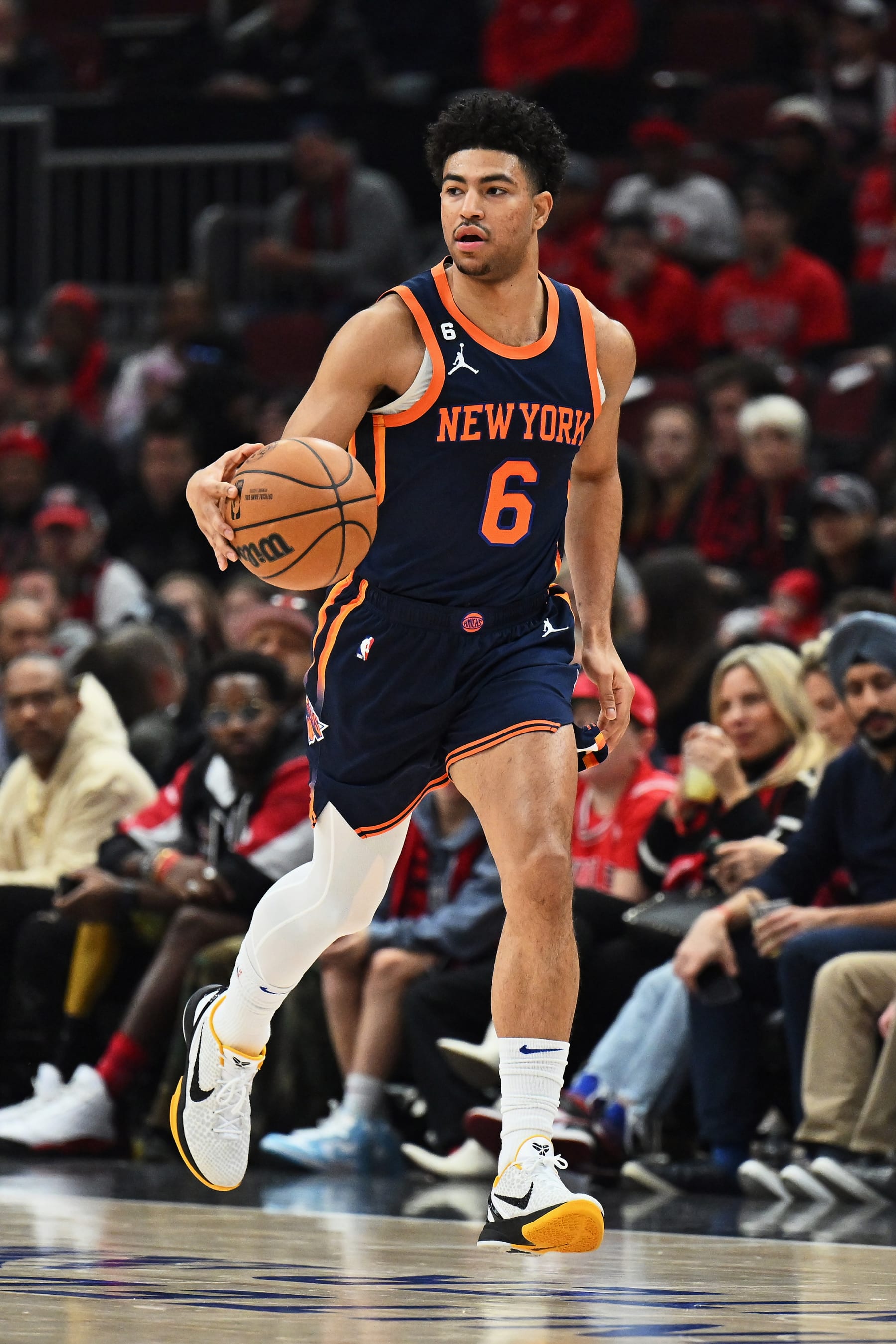 CHICAGO, ILLINOIS - DECEMBER 16:  Quentin Grimes #6 of the New York Knicks controls the ball against the Chicago Bulls on December 16, 2022 at the United Center in Chicago, Illinois. New York defeated Chicago 114-91.  NOTE TO USER: User expressly acknowledges and agrees that, by downloading and or using this photograph, User is consenting to the terms and conditions of the Getty Images License Agreement.  (Photo by Jamie Sabau/Getty Images)