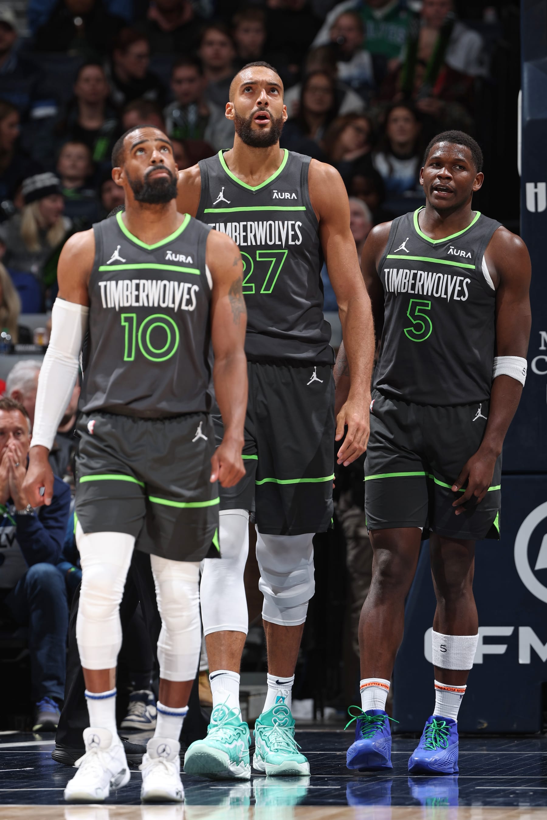 Mike Conley, Rudy Gobert and Anthony Edwards