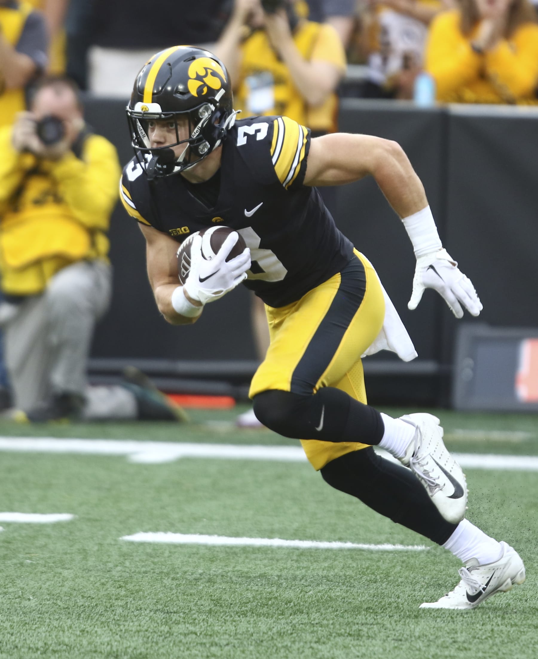 IOWA CITY, IOWA- SEPTEMBER 16:  Defensive back Cooper DeJean #3 of the Iowa Hawkeyes runs back a kick during the first half against the Western Michigan Broncos at Kinnick Stadium on September 16, 2023 in Iowa City, Iowa.  (Photo by Matthew Holst/Getty Images)