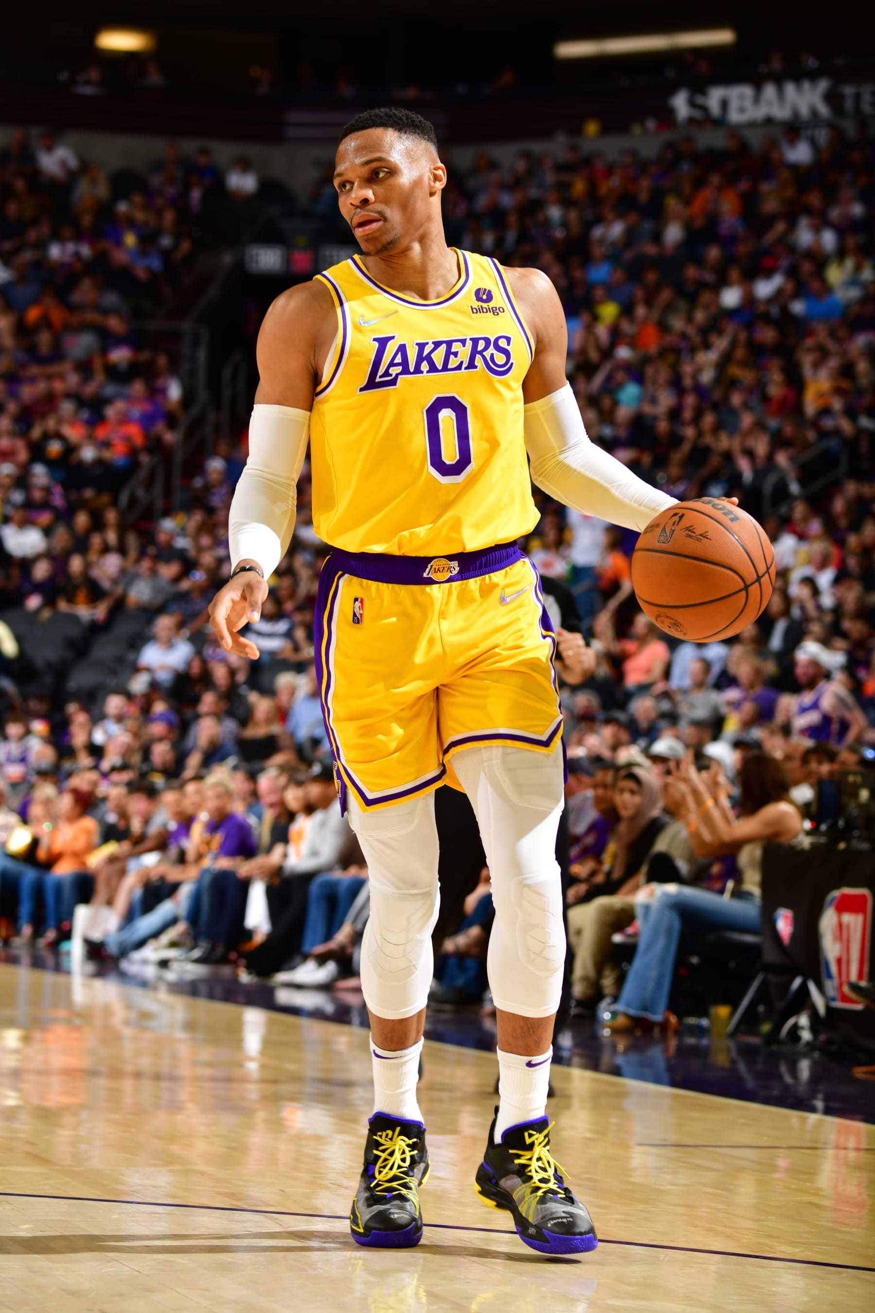 PHOENIX, AZ - APRIL 5: Russell Westbrook #0 of the Los Angeles Lakers dribbles the ball during the game against the Phoenix Suns on April 5, 2022 at Footprint Center in Phoenix, Arizona. NOTE TO USER: User expressly acknowledges and agrees that, by downloading and or using this photograph, user is consenting to the terms and conditions of the Getty Images License Agreement. Mandatory Copyright Notice: Copyright 2022 NBAE (Photo by Barry Gossage/NBAE via Getty Images)