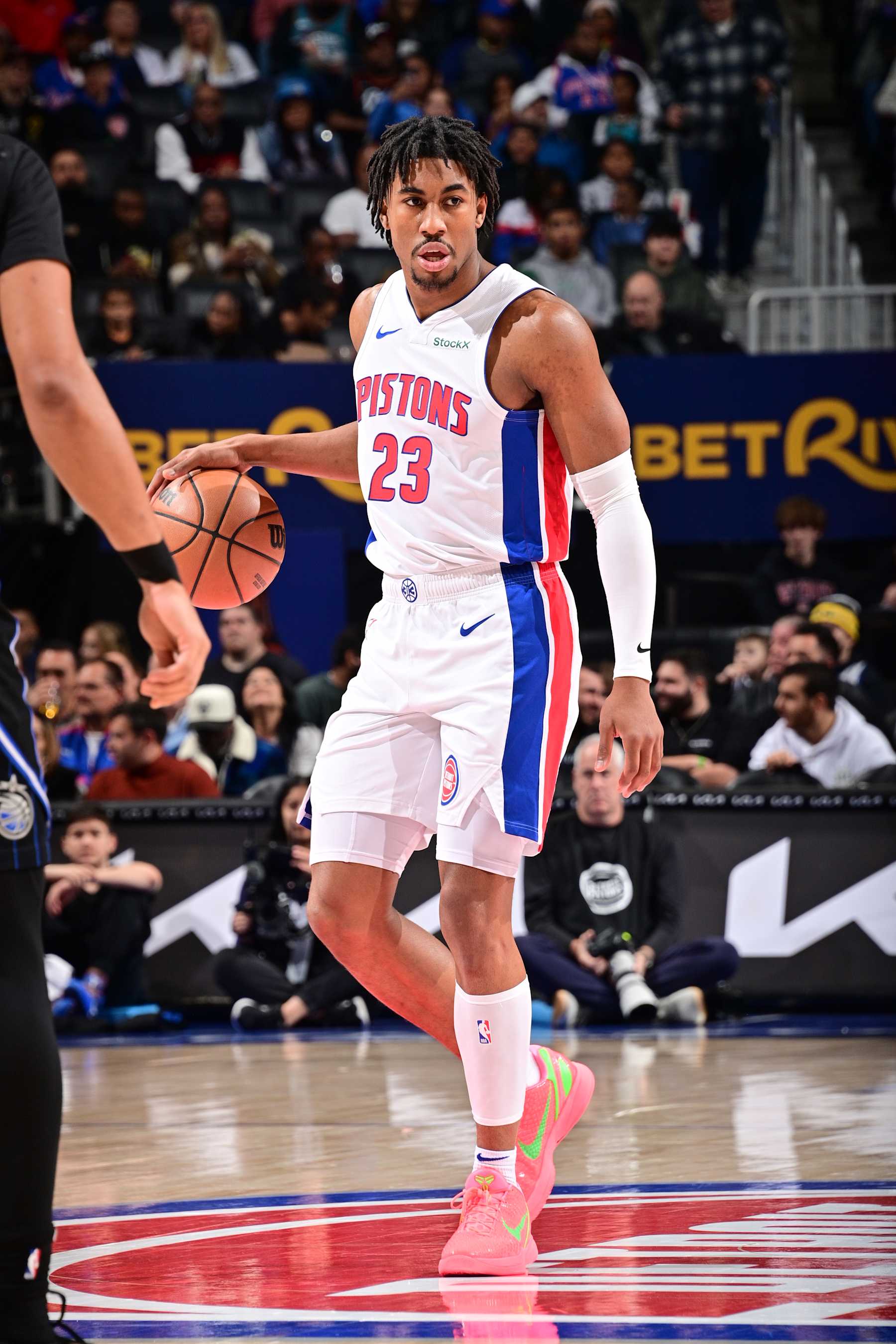 DETROIT, MI - JANUARY 1: Jaden Ivey #23 of the Detroit Pistons dribbles the ball during the game against the Orlando Magic on January 1, 2025 at Little Caesars Arena in Detroit, Michigan. NOTE TO USER: User expressly acknowledges and agrees that, by downloading and/or using this photograph, User is consenting to the terms and conditions of the Getty Images License Agreement. Mandatory Copyright Notice: Copyright 2025 NBAE (Photo by Chris Schwegler/NBAE via Getty Images)