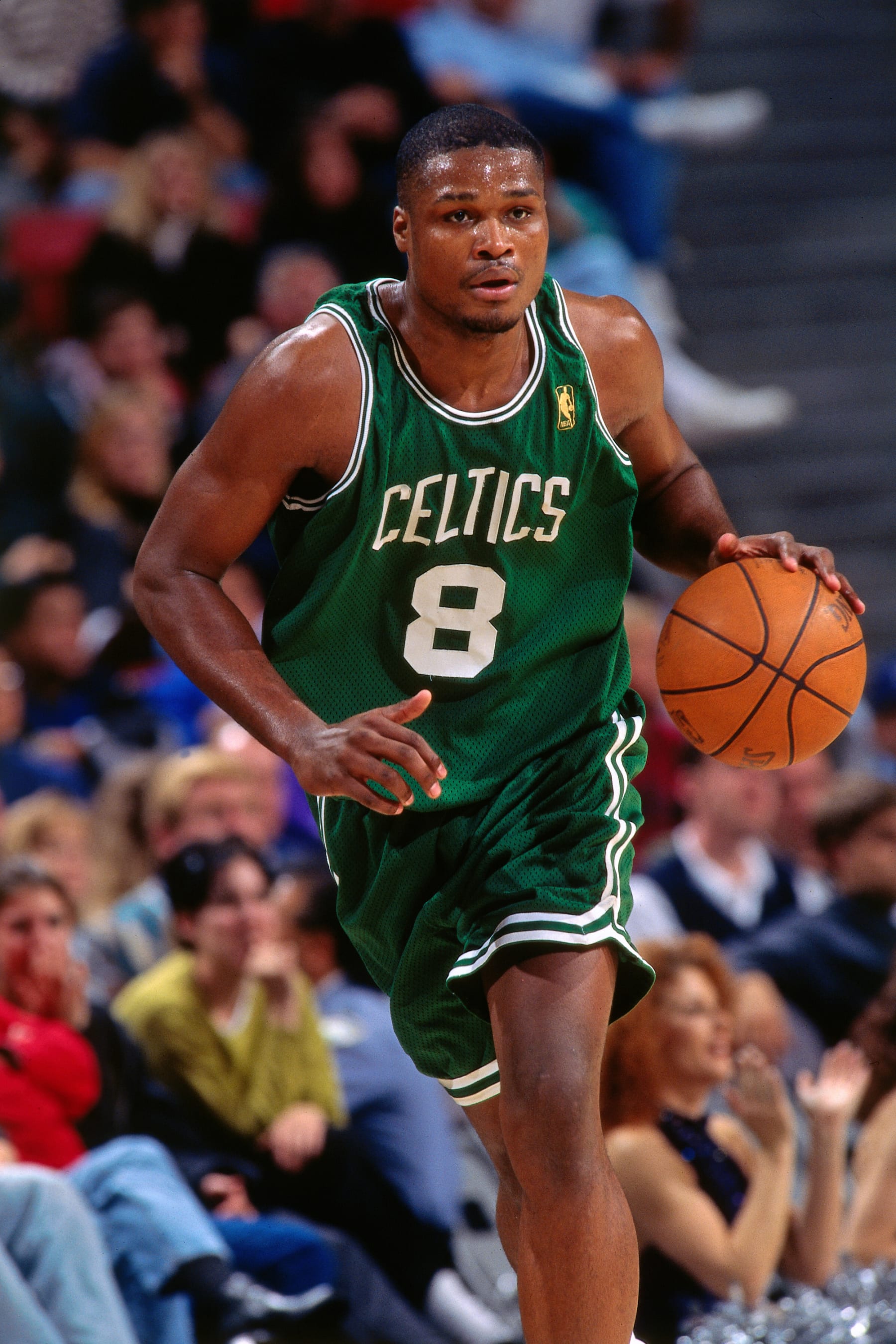 SACRAMENTO - DECEMBER 28: Antoine Walker #8 of the Boston Celtics drives against the Sacramento Kings on December 28, 1996 at Arco Arena in Sacramento, California. NOTE TO USER: User expressly acknowledges and agrees that, by downloading and/or using this photograph, user is consenting to the terms and conditions of the Getty Images License Agreement.  Mandatory Copyright Notice: Copyright 1996 NBAE (Photo by Rocky Widner/NBAE via Getty Images)