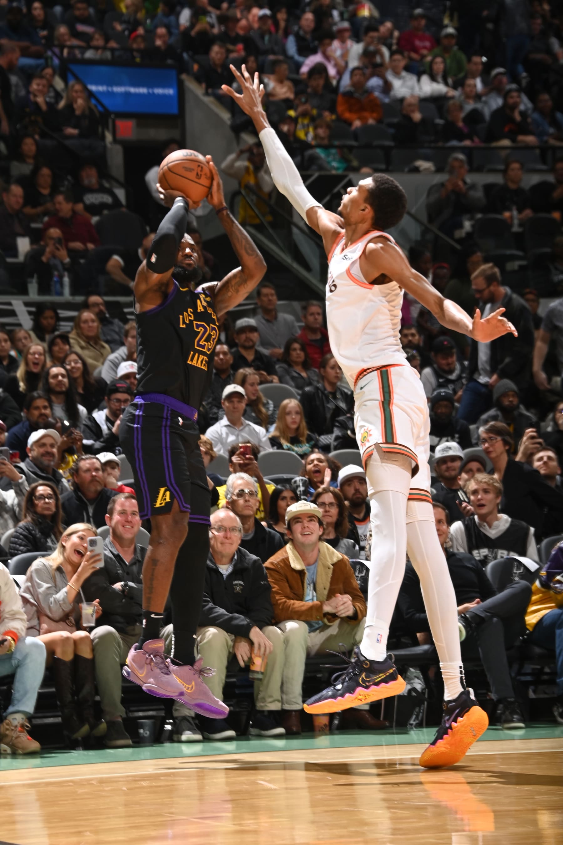 SAN ANTONIO, TX - DECEMBER 15:  LeBron James #23 of the Los Angeles Lakers shoots a three point basket during the game on December 15, 2023 at the Frost Bank Center in San Antonio, Texas. NOTE TO USER: User expressly acknowledges and agrees that, by downloading and or using this photograph, user is consenting to the terms and conditions of the Getty Images License Agreement. Mandatory Copyright Notice: Copyright 2023 NBAE (Photos by Andrew D. Bernstein/NBAE via Getty Images)