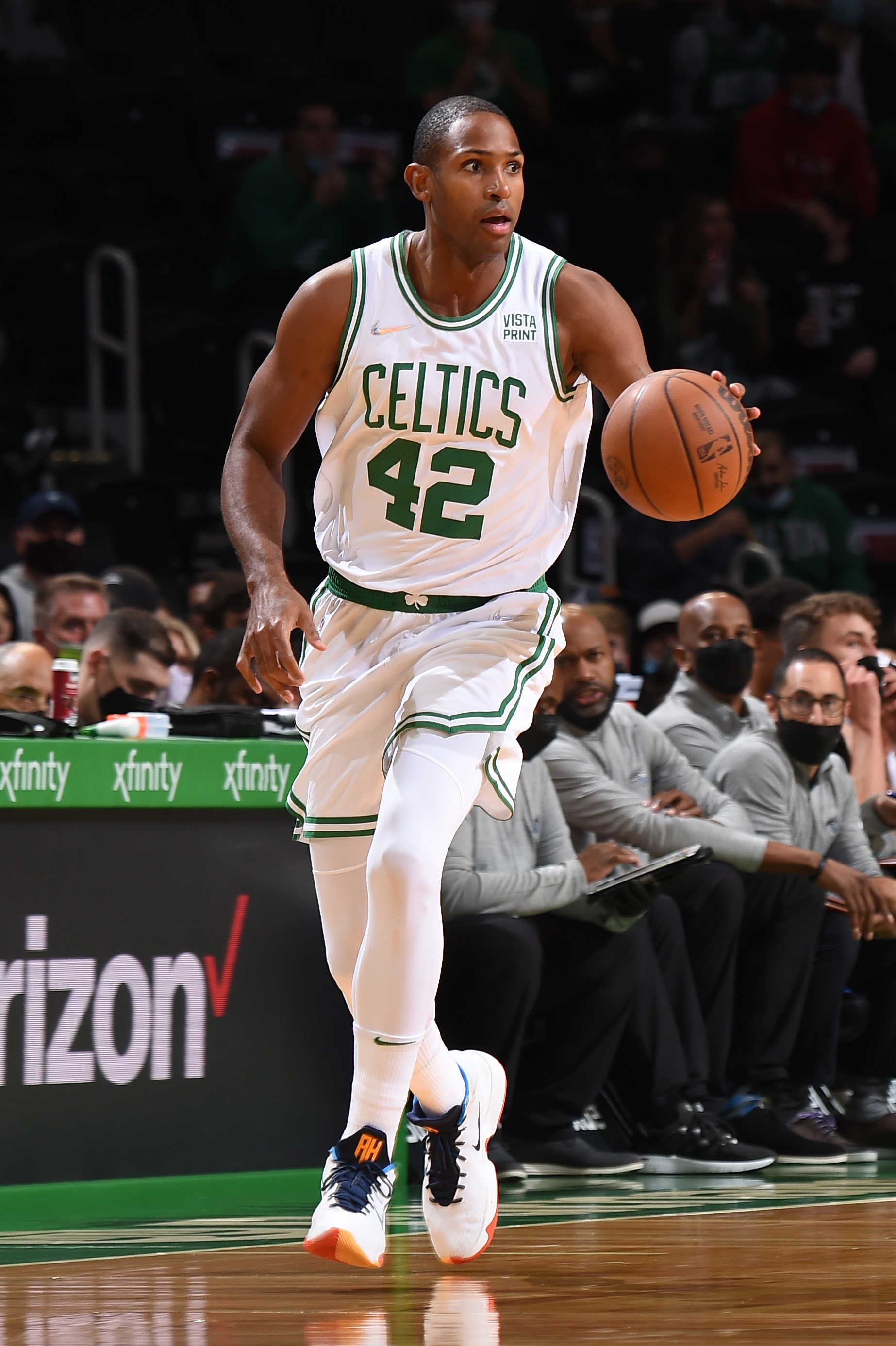 BOSTON, MA - OCTOBER 4: Al Horford #42 of the Boston Celtics dribbles the ball during the game against the Orlando Magic on October 4, 2021 at the TD Garden in Boston, Massachusetts.  NOTE TO USER: User expressly acknowledges and agrees that, by downloading and or using this photograph, User is consenting to the terms and conditions of the Getty Images License Agreement. Mandatory Copyright Notice: Copyright 2021 NBAE  (Photo by Brian Babineau/NBAE via Getty Images)