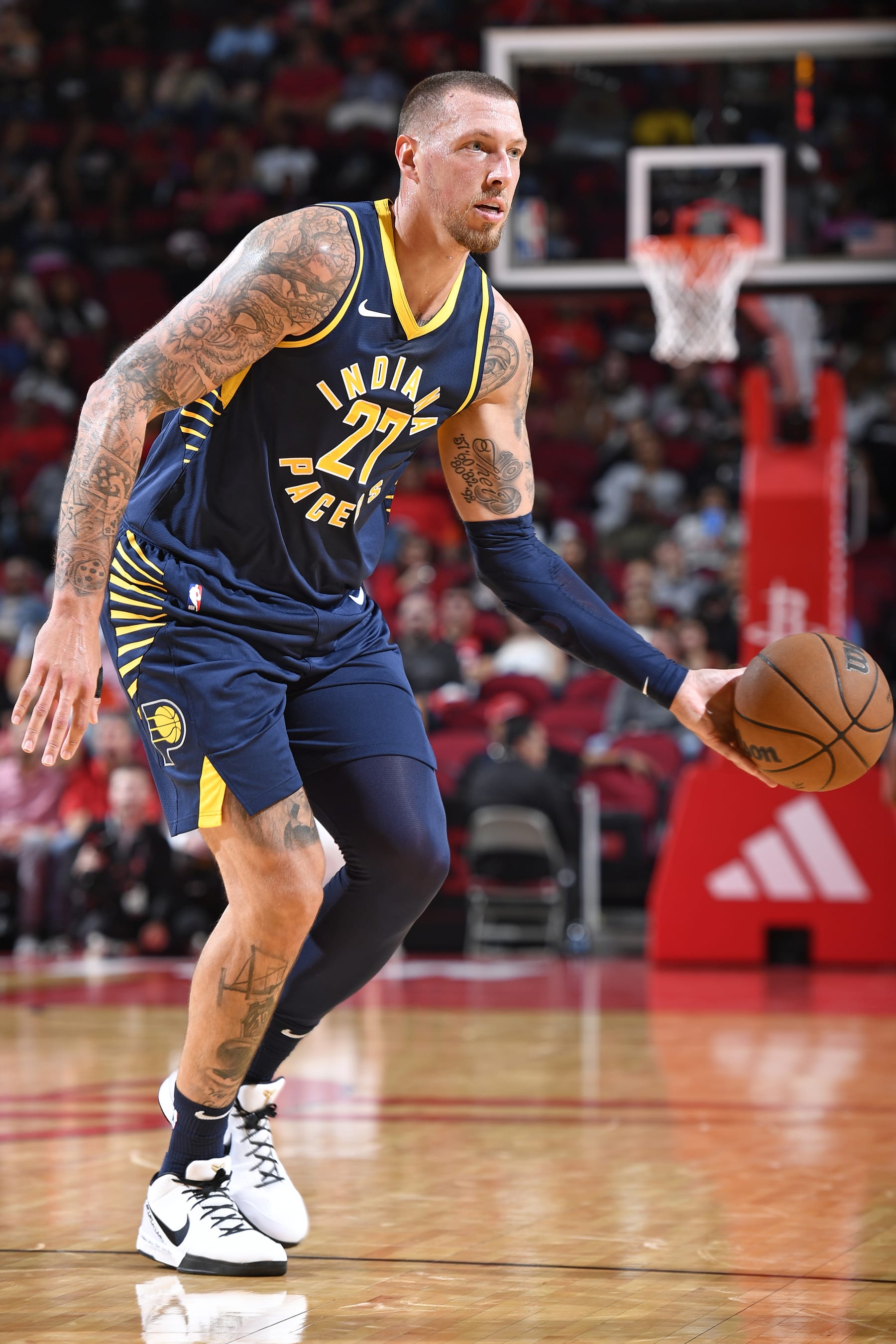 HOUSTON, TX - OCTOBER 10: Daniel Theis #27 of the Indiana Pacers dribbles the ball during the game against the Houston Rockets on October 10, 2023 at the Toyota Center in Houston, TX. NOTE TO USER: User expressly acknowledges and agrees that, by downloading and or using this photograph, User is consenting to the terms and conditions of the Getty Images License Agreement. Mandatory Copyright Notice: Copyright 2023 NBAE (Photo by Logan Riely/NBAE via Getty Images)