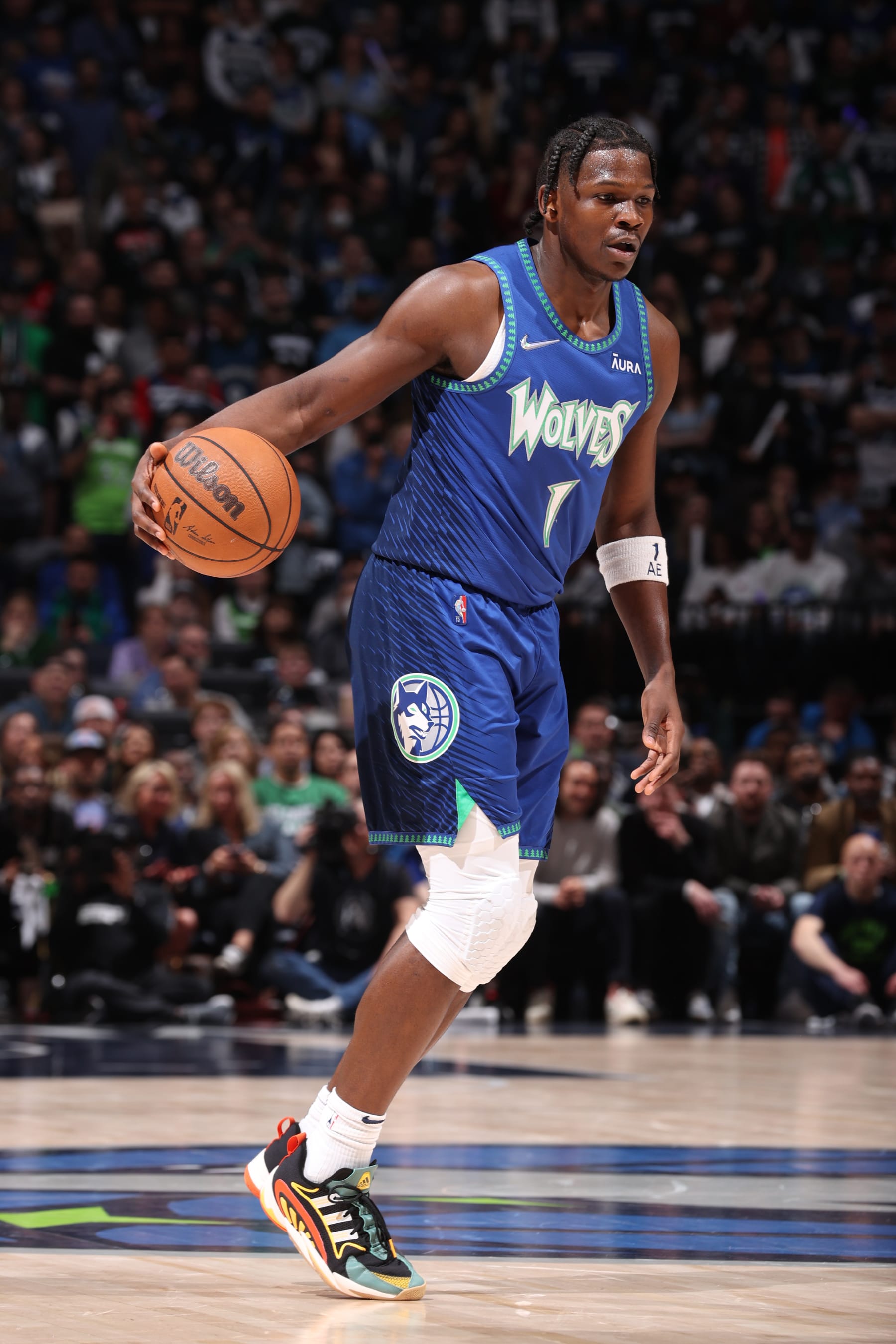 MINNEAPOLIS, MN -  APRIL 29: Anthony Edwards #1 of the Minnesota Timberwolves dribbles the ball against the Memphis Grizzlies during Round 1 Game 6 of the 2022 NBA Playoffs on April 29, 2022 at Target Center in Minneapolis, Minnesota. NOTE TO USER: User expressly acknowledges and agrees that, by downloading and or using this Photograph, user is consenting to the terms and conditions of the Getty Images License Agreement. Mandatory Copyright Notice: Copyright 2022 NBAE (Photo by Joe Murphy/NBAE via Getty Images)