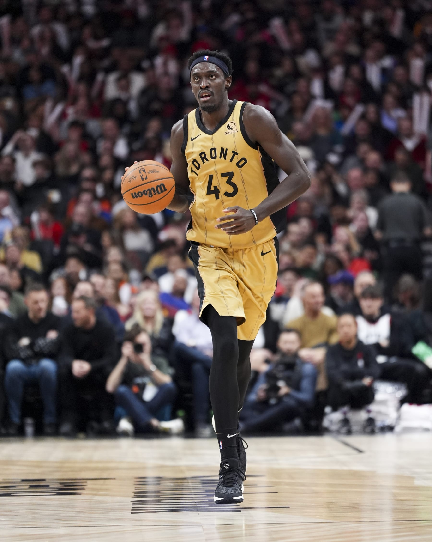 TORONTO, ON - DECEMBER 1: Pascal Siakam #43 of the Toronto Raptors dribbles against the New York Knicks during the second half of their basketball game at the Scotiabank Arena on December 1, 2023 in Toronto, Ontario, Canada. NOTE TO USER: User expressly acknowledges and agrees that, by downloading and/or using this Photograph, user is consenting to the terms and conditions of the Getty Images License Agreement. (Photo by Mark Blinch/Getty Images)