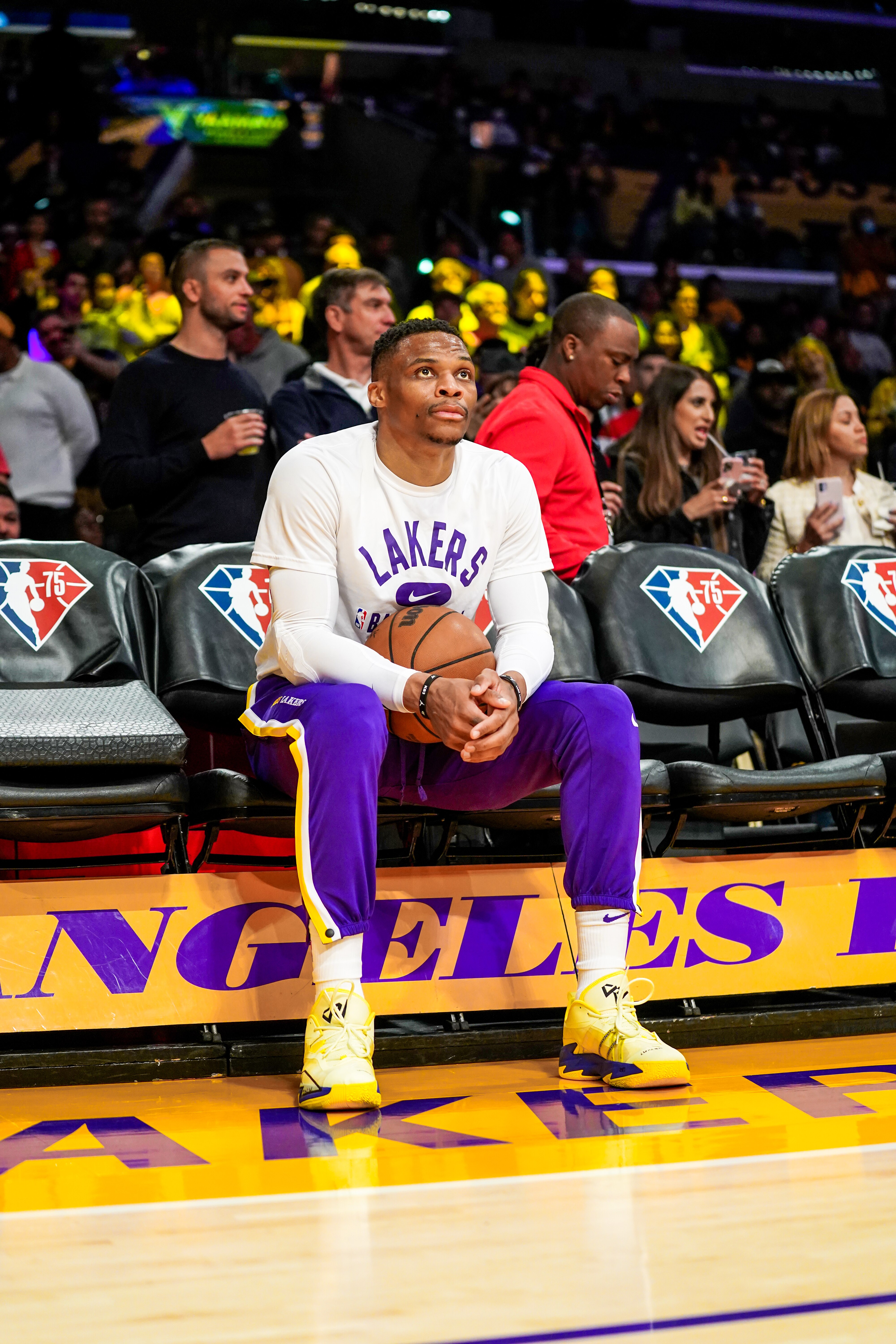 LOS ANGELES, CA - APRIL 3: Russell Westbrook #0 of the Los Angeles Lakers looks on prior to the game against the Denver Nuggets on April 3, 2022 at Crypto.Com Arena in Los Angeles, California. NOTE TO USER: User expressly acknowledges and agrees that, by downloading and/or using this Photograph, user is consenting to the terms and conditions of the Getty Images License Agreement. Mandatory Copyright Notice: Copyright 2022 NBAE (Photo by Tyler Ross/NBAE via Getty Images)