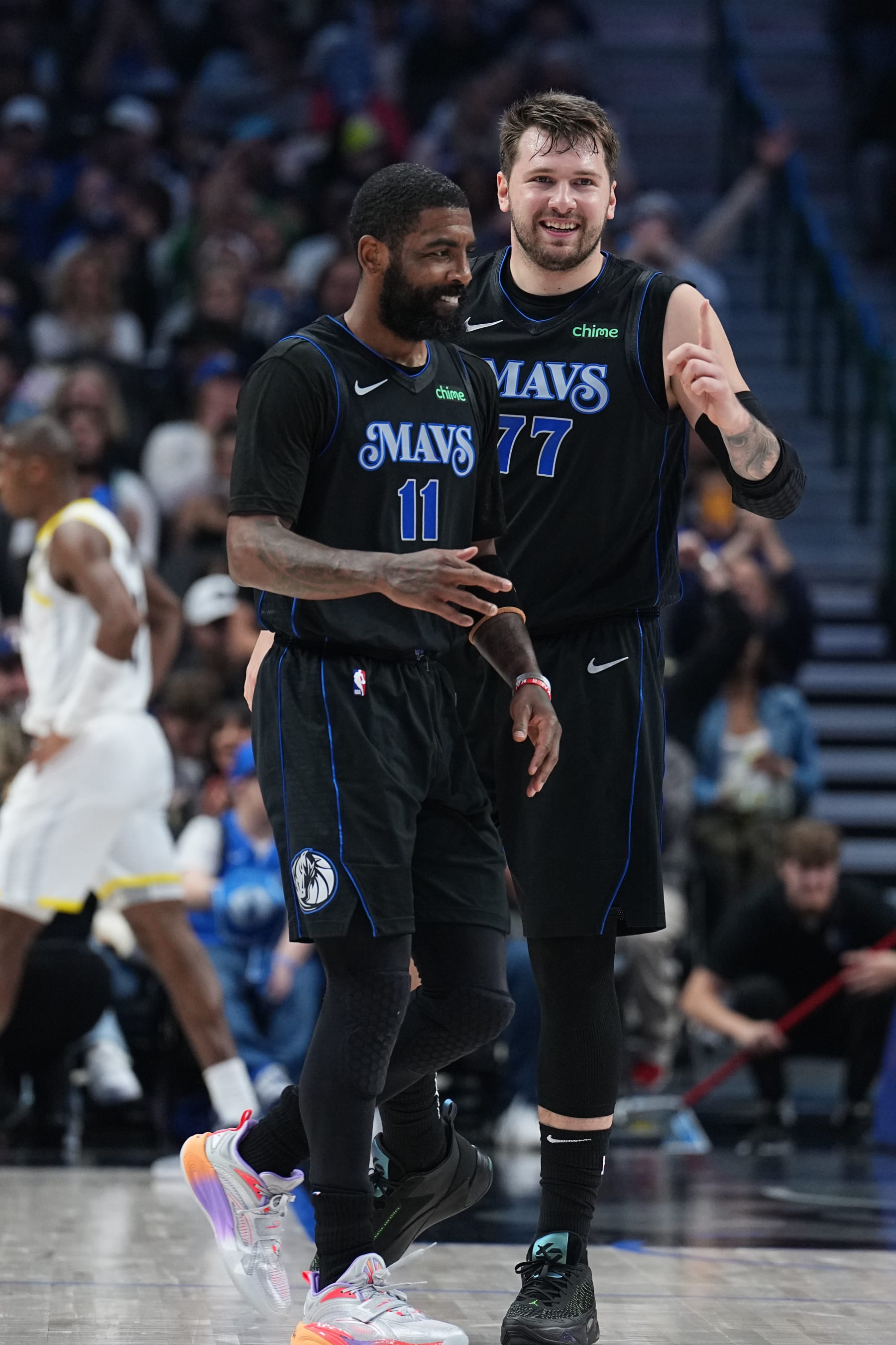 DALLAS, TX - MARCH 21: Kyrie Irving #11 and Luka Doncic #77 of the Dallas Mavericks during the game against the Utah Jazz on March 21, 2024 at the American Airlines Center in Dallas, Texas. NOTE TO USER: User expressly acknowledges and agrees that, by downloading and or using this photograph, User is consenting to the terms and conditions of the Getty Images License Agreement. Mandatory Copyright Notice: Copyright 2024 NBAE (Photo by Glenn James/NBAE via Getty Images)