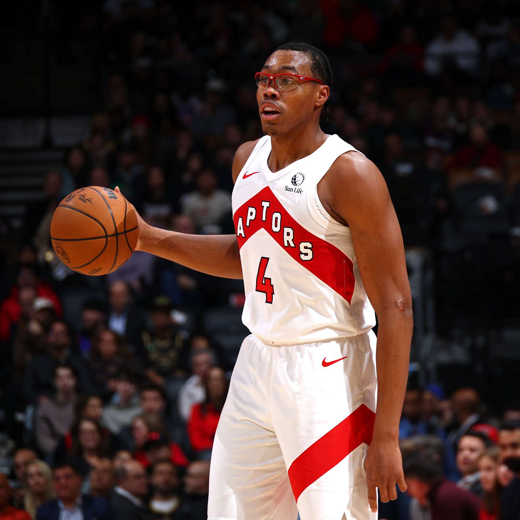 TORONTO, CANADA - DECEMBER 9: Scottie Barnes #4 of the Toronto Raptors looks on during the game against the New York Knicks on December 9, 2024 at the Scotiabank Arena in Toronto, Ontario, Canada.  NOTE TO USER: User expressly acknowledges and agrees that, by downloading and or using this Photograph, user is consenting to the terms and conditions of the Getty Images License Agreement.  Mandatory Copyright Notice: Copyright 2024 NBAE (Photo by Vaughn Ridley/NBAE via Getty Images)