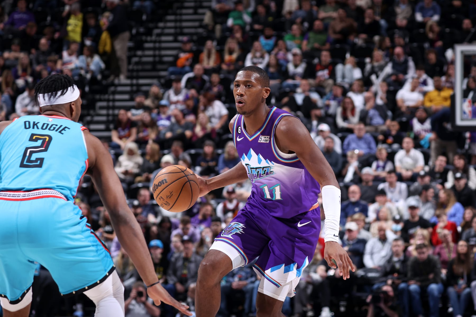SALT LAKE CITY, UT - MARCH 27: Kris Dunn #11 of the Utah Jazz moves the ball during the game against the Phoenix Suns on March 27, 2023 at vivint.SmartHome Arena in Salt Lake City, Utah. NOTE TO USER: User expressly acknowledges and agrees that, by downloading and or using this Photograph, User is consenting to the terms and conditions of the Getty Images License Agreement. Mandatory Copyright Notice: Copyright 2023 NBAE (Photo by Melissa Majchrzak/NBAE via Getty Images)