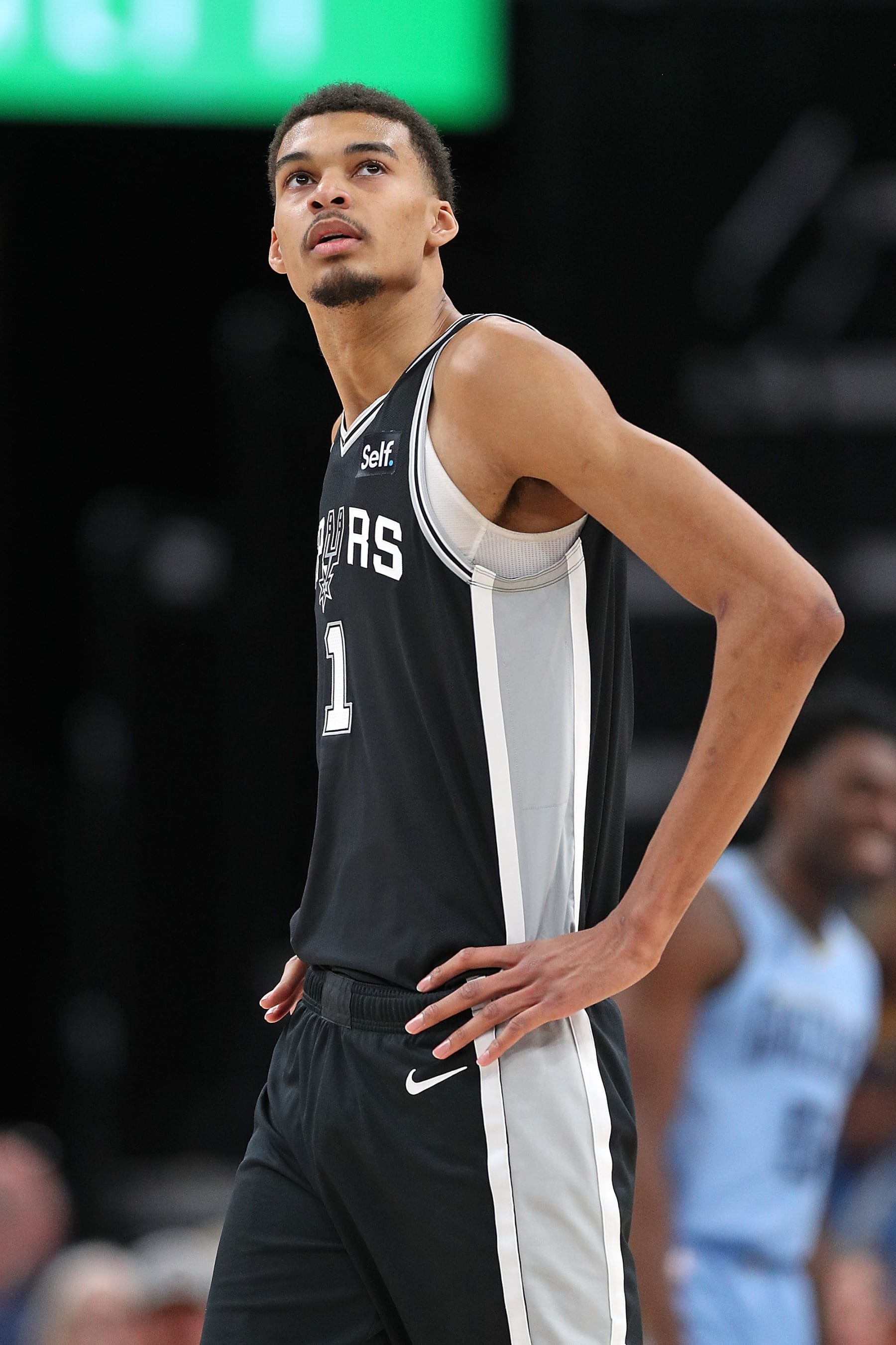 MEMPHIS, TENNESSEE - JANUARY 02: Victor Wembanyama #1 of the San Antonio Spurs looks on during the game against the Memphis Grizzlies at FedExForum on January 02, 2024 in Memphis, Tennessee. NOTE TO USER: User expressly acknowledges and agrees that, by downloading and or using this photograph, User is consenting to the terms and conditions of the Getty Images License Agreement. (Photo by Justin Ford/Getty Images)