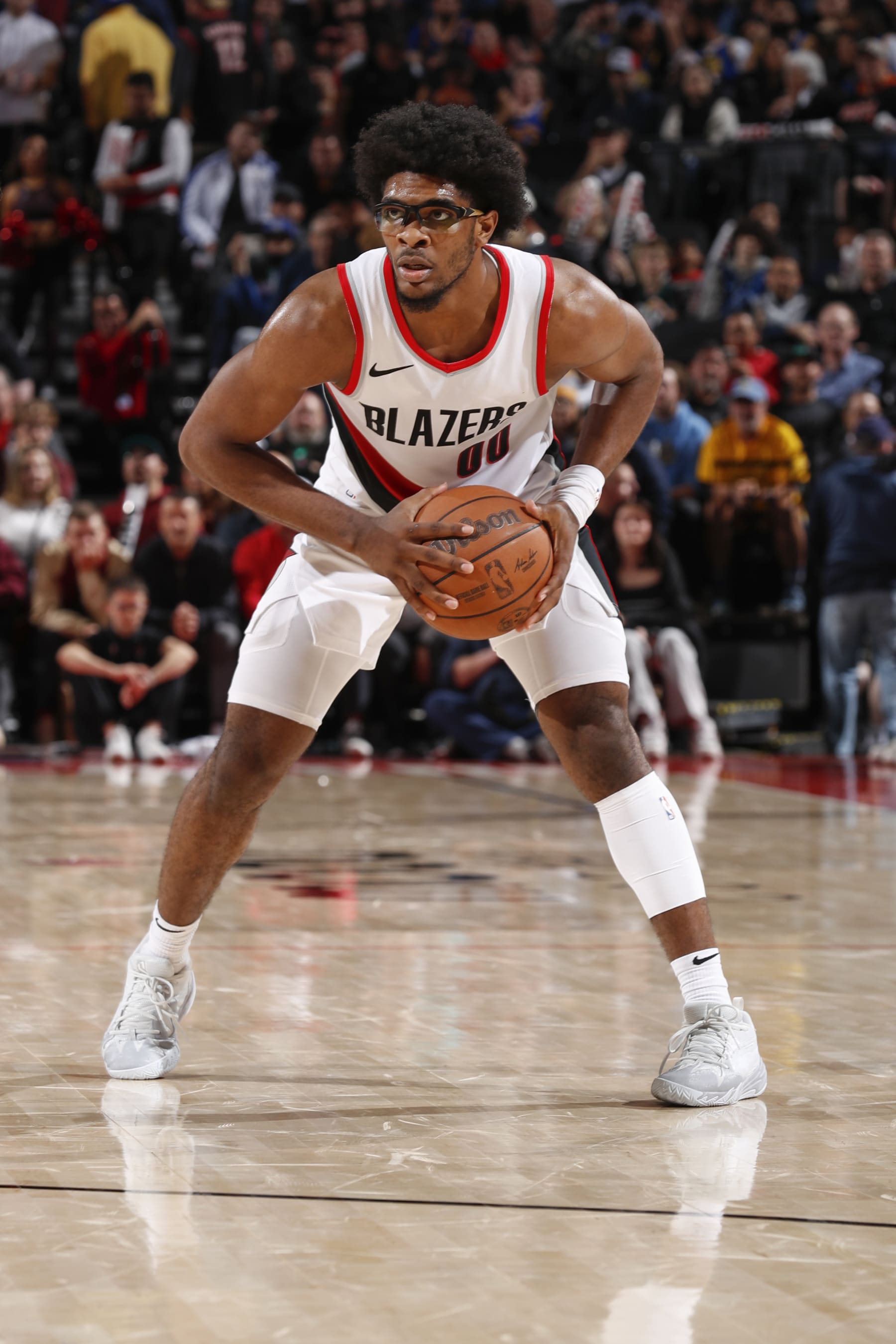 PORTLAND, OR - APRIL 11:  Scoot Henderson #00 of the Portland Trail Blazers handles the ball during the game  on April 11, 2024 at the Moda Center Arena in Portland, Oregon. NOTE TO USER: User expressly acknowledges and agrees that, by downloading and or using this photograph, user is consenting to the terms and conditions of the Getty Images License Agreement. Mandatory Copyright Notice: Copyright 2024 NBAE (Photo by Cameron Browne/NBAE via Getty Images)