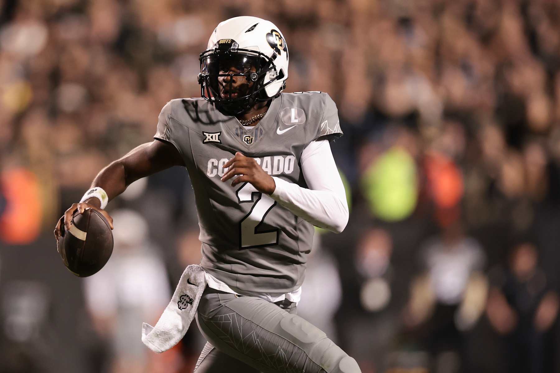 BOULDER, COLORADO - OCTOBER 26: Shedeur Sanders #2 of the Colorado Buffaloes runs with the ball during the second quarter against the Cincinnati Bearcats at Folsom Field on October 26, 2024 in Boulder, Colorado. (Photo by Andrew Wevers/Getty Images)