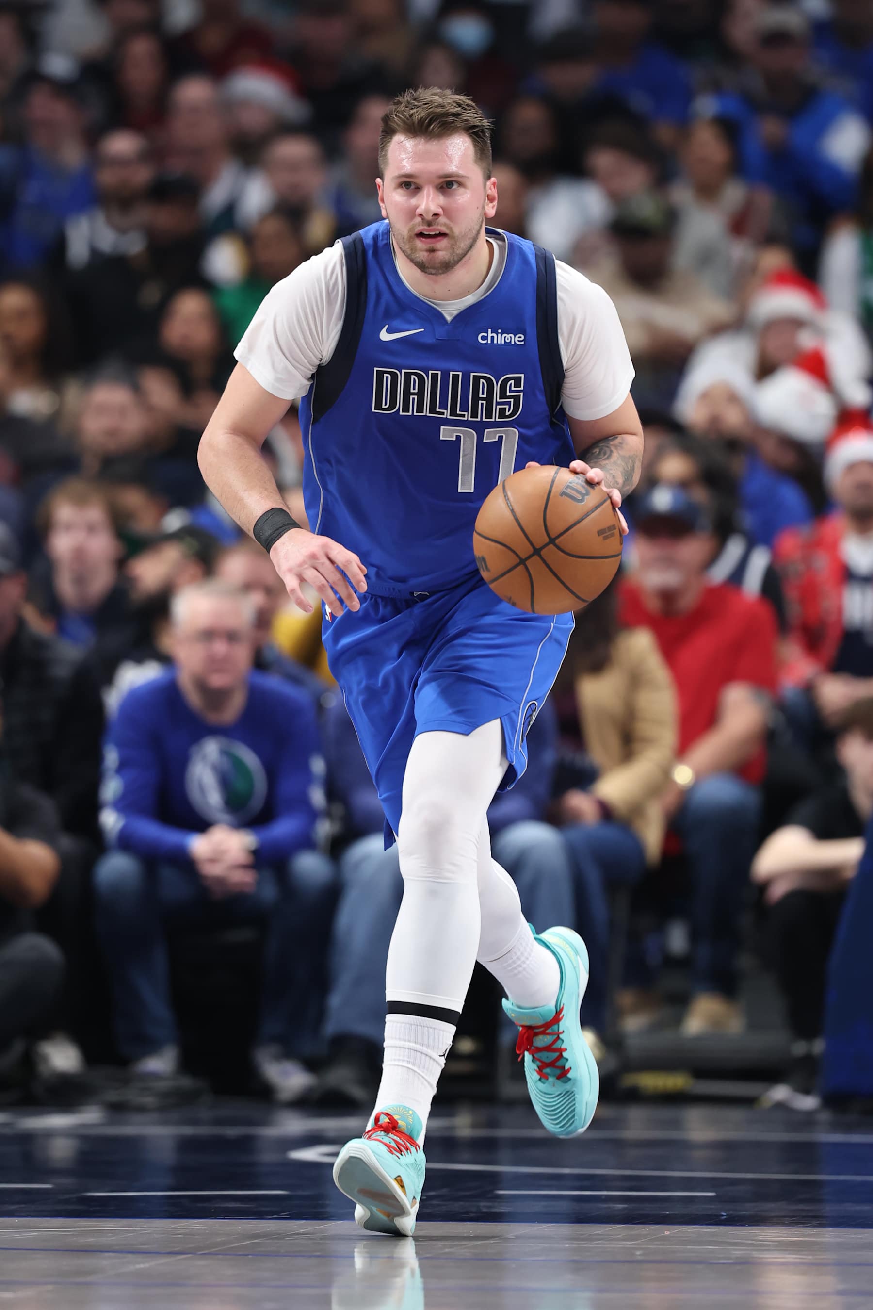 DALLAS, TX - DECEMBER 25: Luka Doncic #77 of the Dallas Mavericks dribbles the ball during the game against the Minnesota Timberwolves on December 25, 2024 at American Airlines Center in Dallas, Texas. NOTE TO USER: User expressly acknowledges and agrees that, by downloading and or using this photograph, User is consenting to the terms and conditions of the Getty Images License Agreement. Mandatory Copyright Notice: Copyright 2024 NBAE (Photo by David Sherman/NBAE via Getty Images)