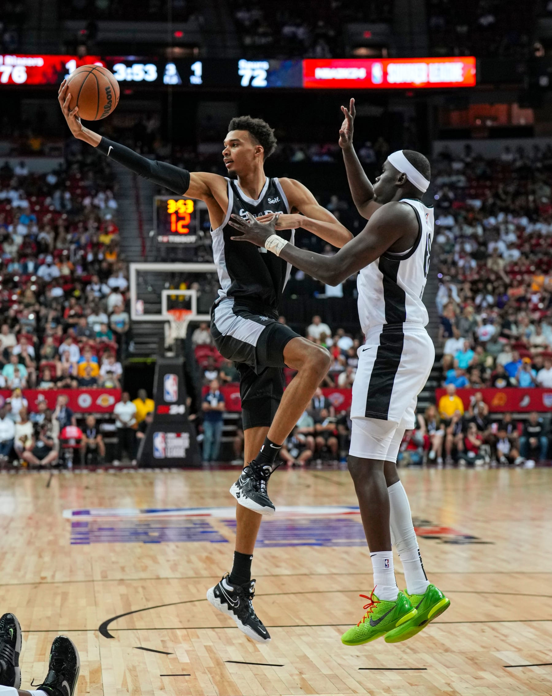 LAS VEGAS, NV - JULY 9: Victor Wembanyama #1 of the San Antonio Spurs looks to pass the ball against the Portland Trail Blazers during 2023 NBA Las Vegas Summer League on July 9, 2023 at the Thomas & Mack Center in Las Vegas, Nevada. NOTE TO USER: User expressly acknowledges and agrees that, by downloading and or using this photograph, User is consenting to the terms and conditions of the Getty Images License Agreement. Mandatory Copyright Notice: Copyright 2023 NBAE (Photo by Ryan Stetz/NBAE via Getty Images)