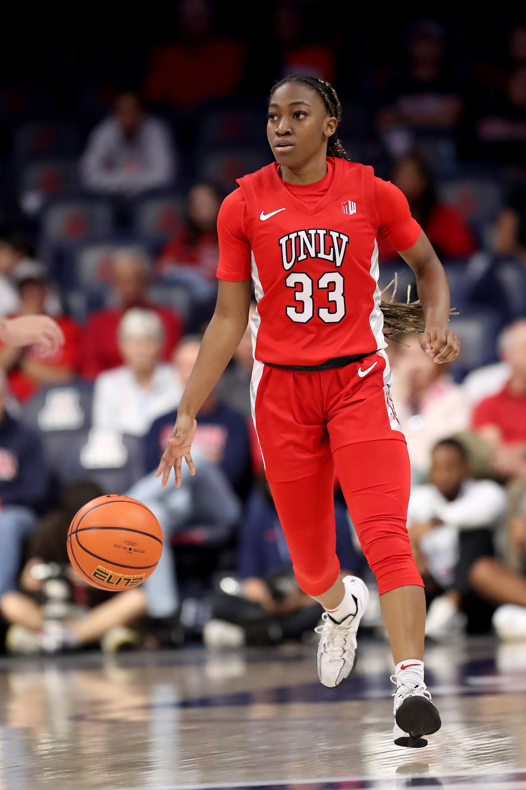 TUCSON, AZ - NOVEMBER 12: UNLV Lady Rebels guard Amarachi Kimpson #33 during a basketball game between the UNLV Lady Rebels and the University of Arizona Wildcats.  November 12, 2024 at McKale Center in Tucson, AZ. (Photo by Christopher Hook/Icon Sportswire via Getty Images)