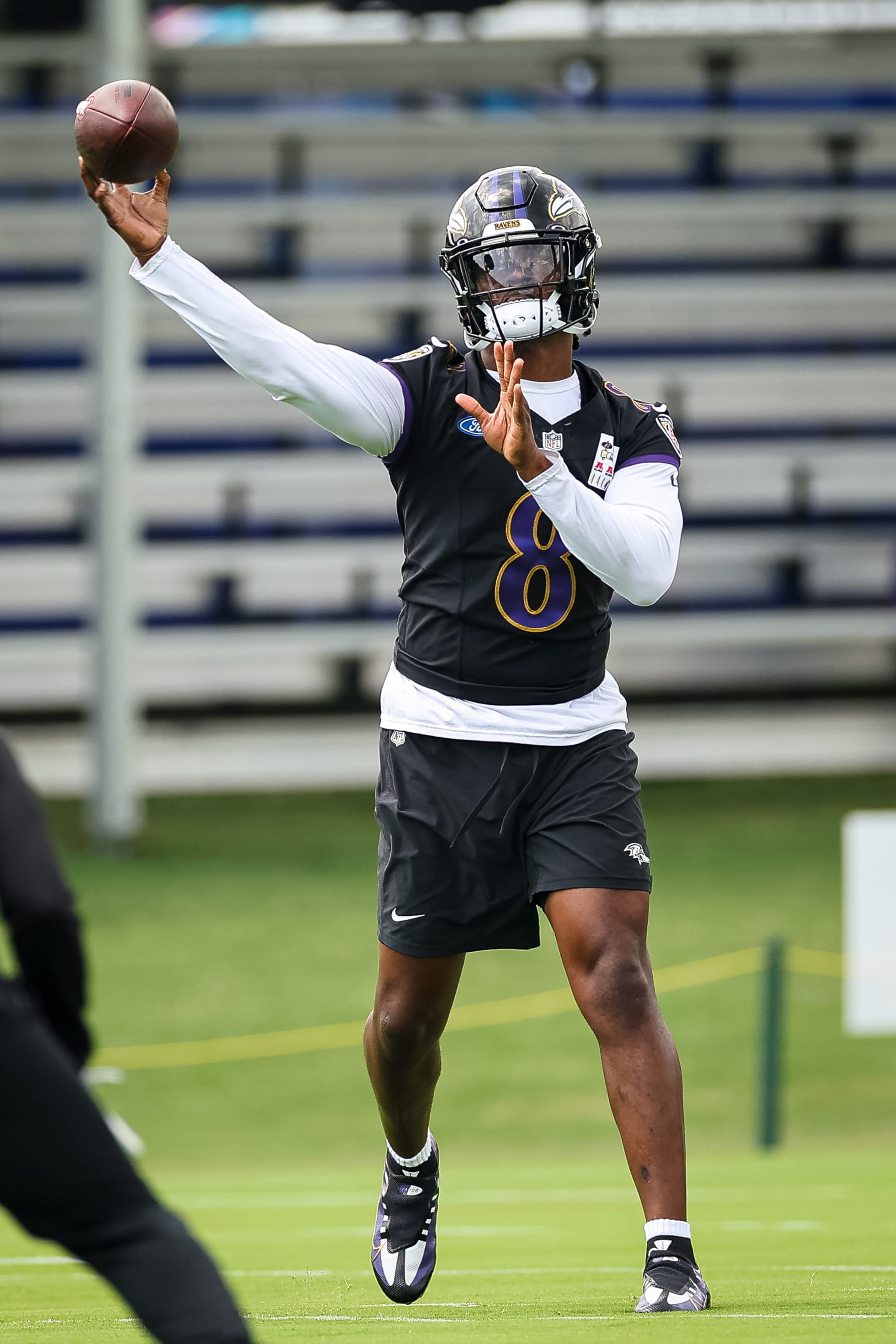 OWINGS MILLS, MD - JULY 27: Lamar Jackson #8 of the Baltimore Ravens attempts a pass during training camp at Under Armour Performance Center Baltimore Ravens on July 27, 2023 in Owings Mills, Maryland. (Photo by Scott Taetsch/Getty Images)