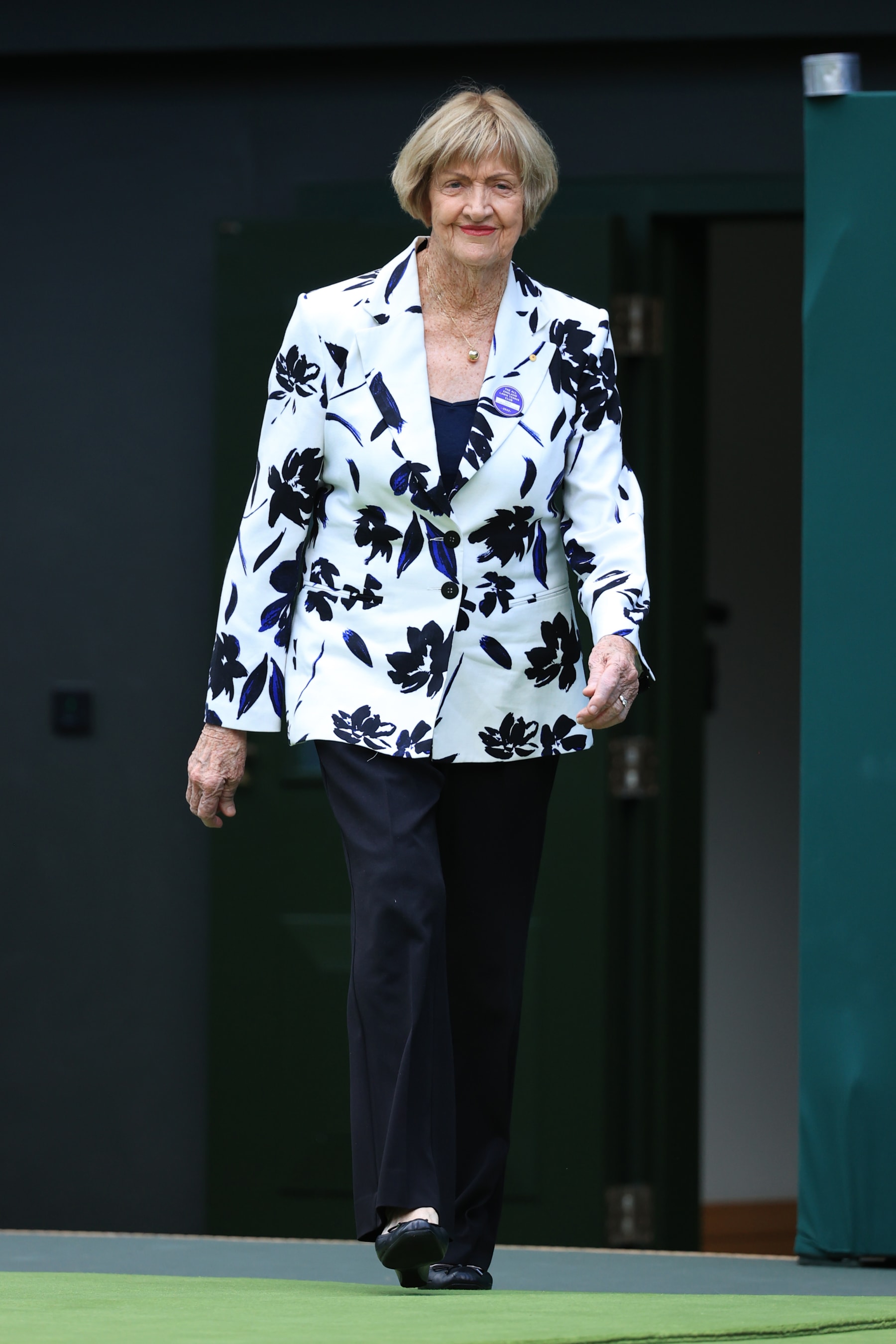 LONDON, ENGLAND - JULY 03: Margaret Court walks out onto Centre Court during a ceremony to celebrate it's 100th anniversary during day seven of The Championships Wimbledon 2022 at All England Lawn Tennis and Croquet Club on July 3, 2022 in London, England. (Photo by Simon Stacpoole/Offside/Offside via Getty Images)