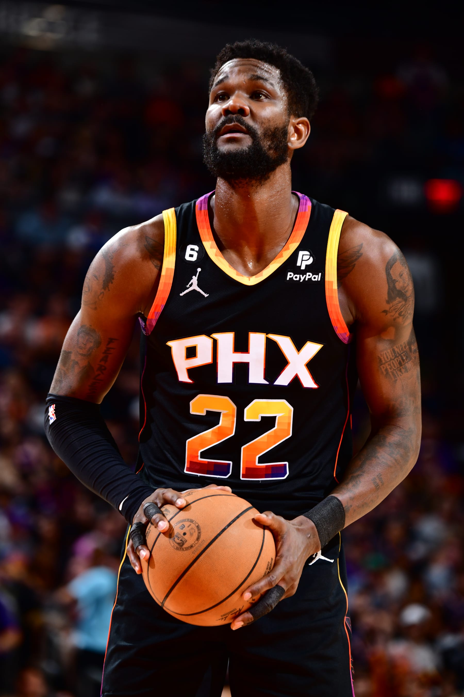 PHOENIX, AZ - MAY 7:  Deandre Ayton #22 of the Phoenix Suns shoots a free throw during the game during round two game four of the 2023 NBA Playoffs on May 7, 2023 at Footprint Center in Phoenix, Arizona. NOTE TO USER: User expressly acknowledges and agrees that, by downloading and or using this photograph, user is consenting to the terms and conditions of the Getty Images License Agreement. Mandatory Copyright Notice: Copyright 2022 NBAE (Photo by Barry Gossage/NBAE via Getty Images)