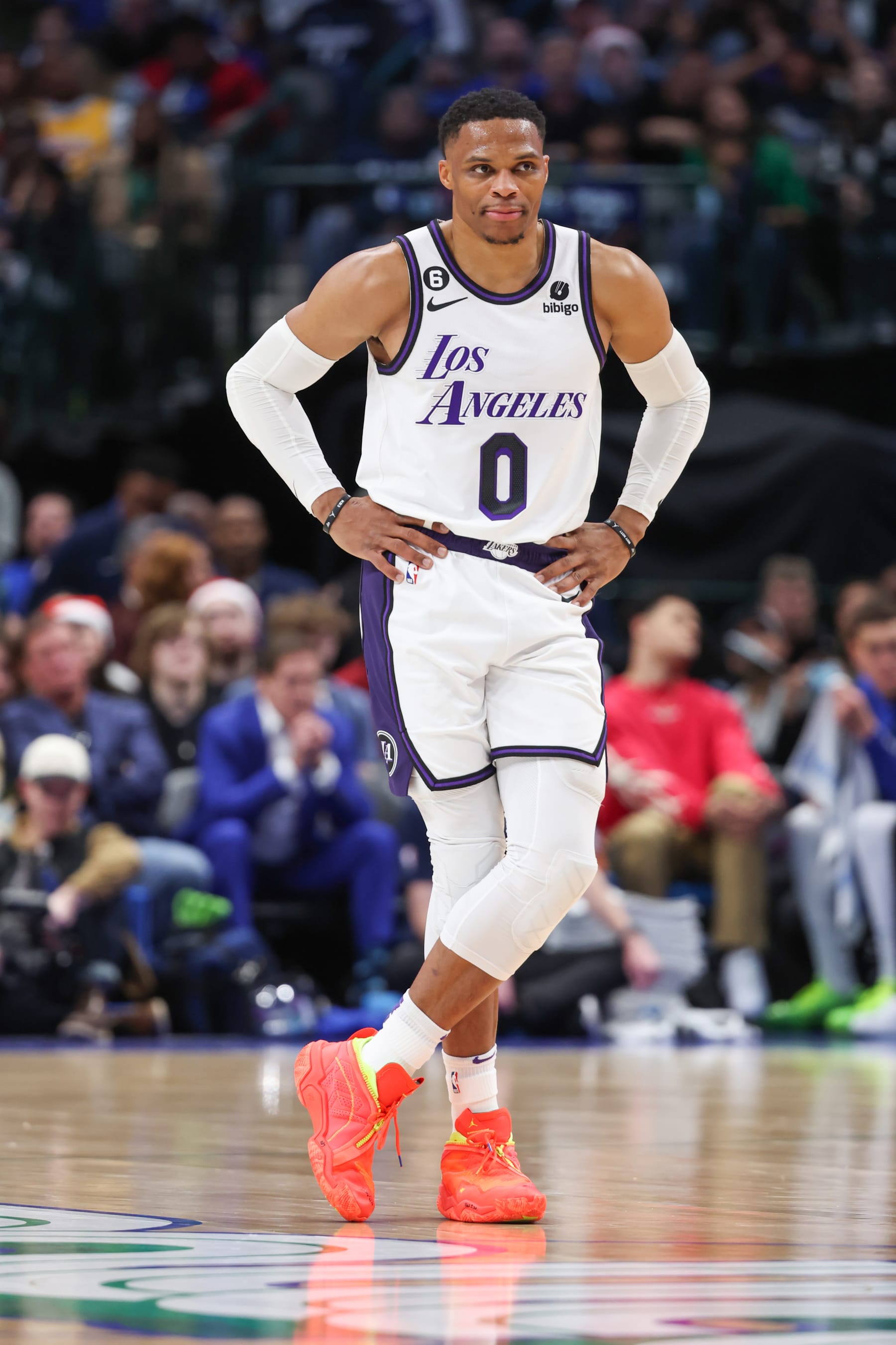 DALLAS, TX - DECEMBER 25:  Russell Westbrook #0 of the Los Angeles Lakers looks on during the game against the Dallas Mavericks on December 25, 2022 at the American Airlines Center in Dallas, Texas. NOTE TO USER: User expressly acknowledges and agrees that, by downloading and or using this photograph, User is consenting to the terms and conditions of the Getty Images License Agreement. Mandatory Copyright Notice: Copyright 2022 NBAE (Photo by David Sherman/NBAE via Getty Images)