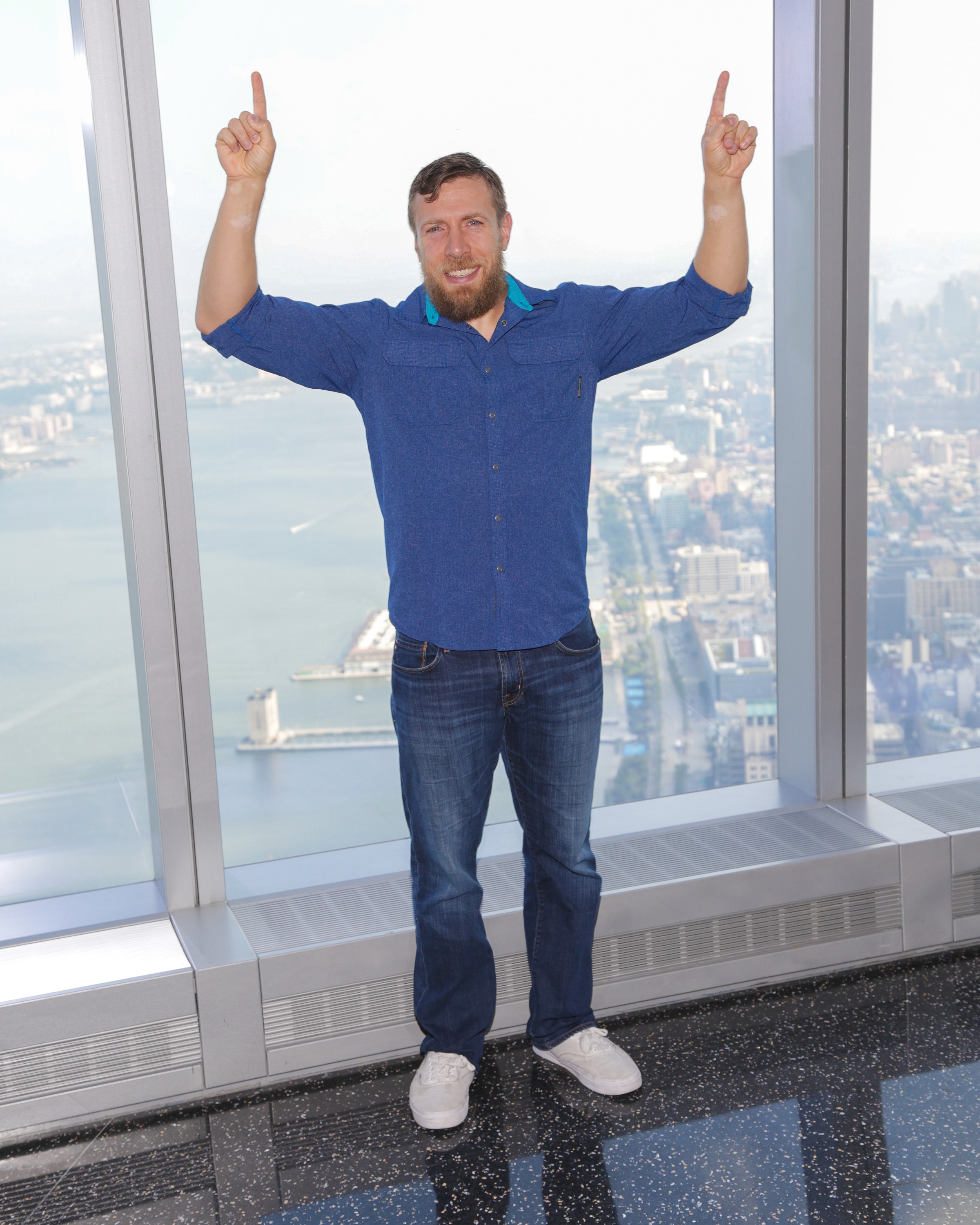 NEW YORK, NY - AUGUST 20:  General manager of SmackDown Daniel Bryan poses for photographs during his visit to One World Observatory in advance of SummerSlam on August 20, 2016 in New York City.  (Photo by Brent N. Clarke/Getty Images)