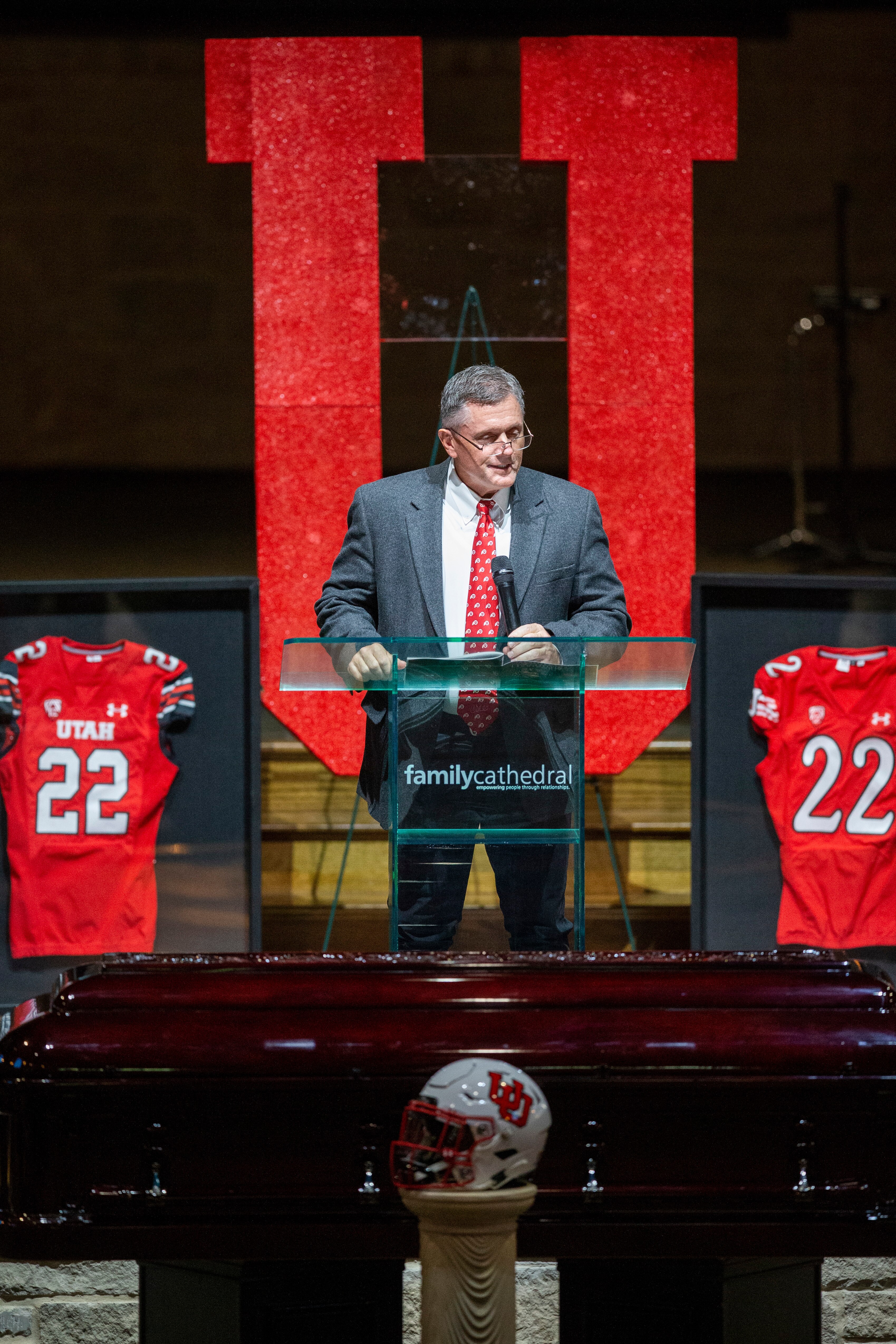 Utah head football coach Kyle Whittingham memorializes Aaron Lowe during a funeral service at Family Cathedral of Praise, Monday, Oct. 11, 2021, in Mesquite, Texas. Lowe, a student and football player at the University of Utah, was was shot and killed on Sept. 26 at a post-game party. (AP Photo/Brandon Wade)