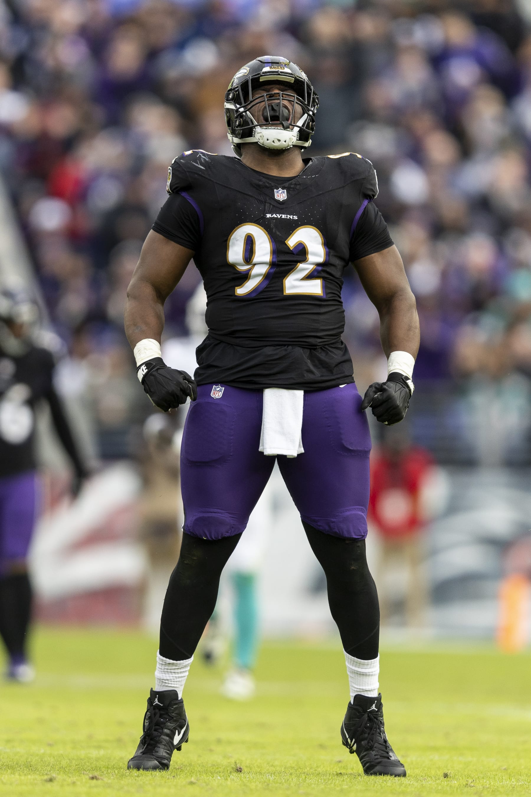 BALTIMORE, MARYLAND - DECEMBER 31: Justin Madubuike #92 of the Baltimore Ravens reacts during an NFL football game between the Baltimore Ravens and the Miami Dolphins at M&T Bank Stadium on December 31, 2023 in Baltimore, Maryland. (Photo by Michael Owens/Getty Images)