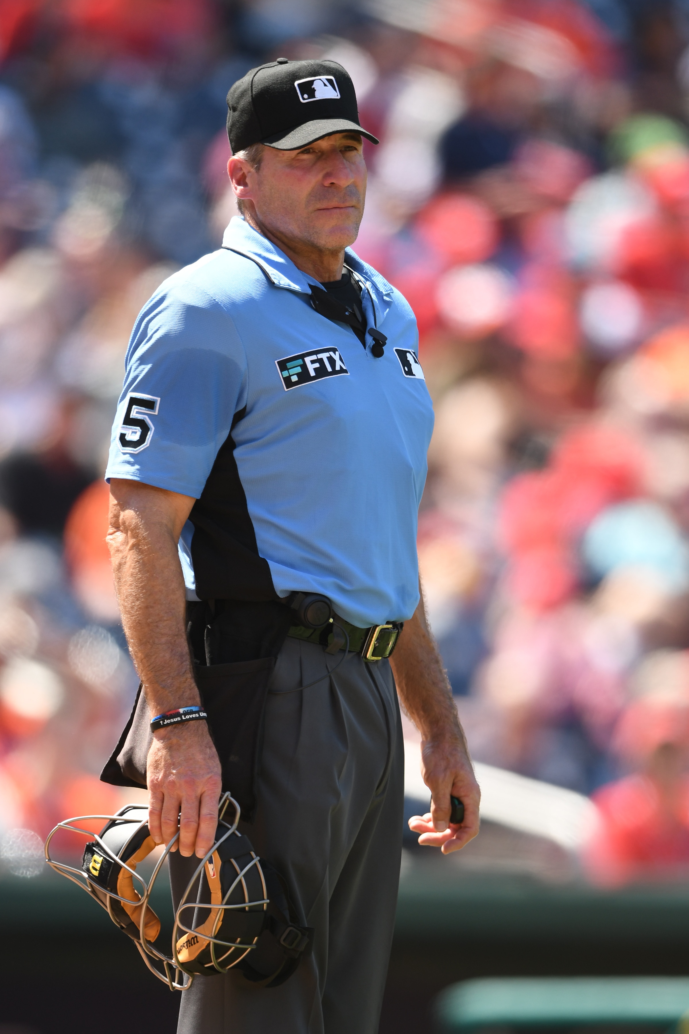 WASHINGTON, DC - MAY 15:  Umpire Angel Hernandez looks on during a baseball game between the Houston Astros and the Washington Nationals at Nationals Park on May 15, 2022 in Washington DC.  (Photo by Mitchell Layton/Getty Images)