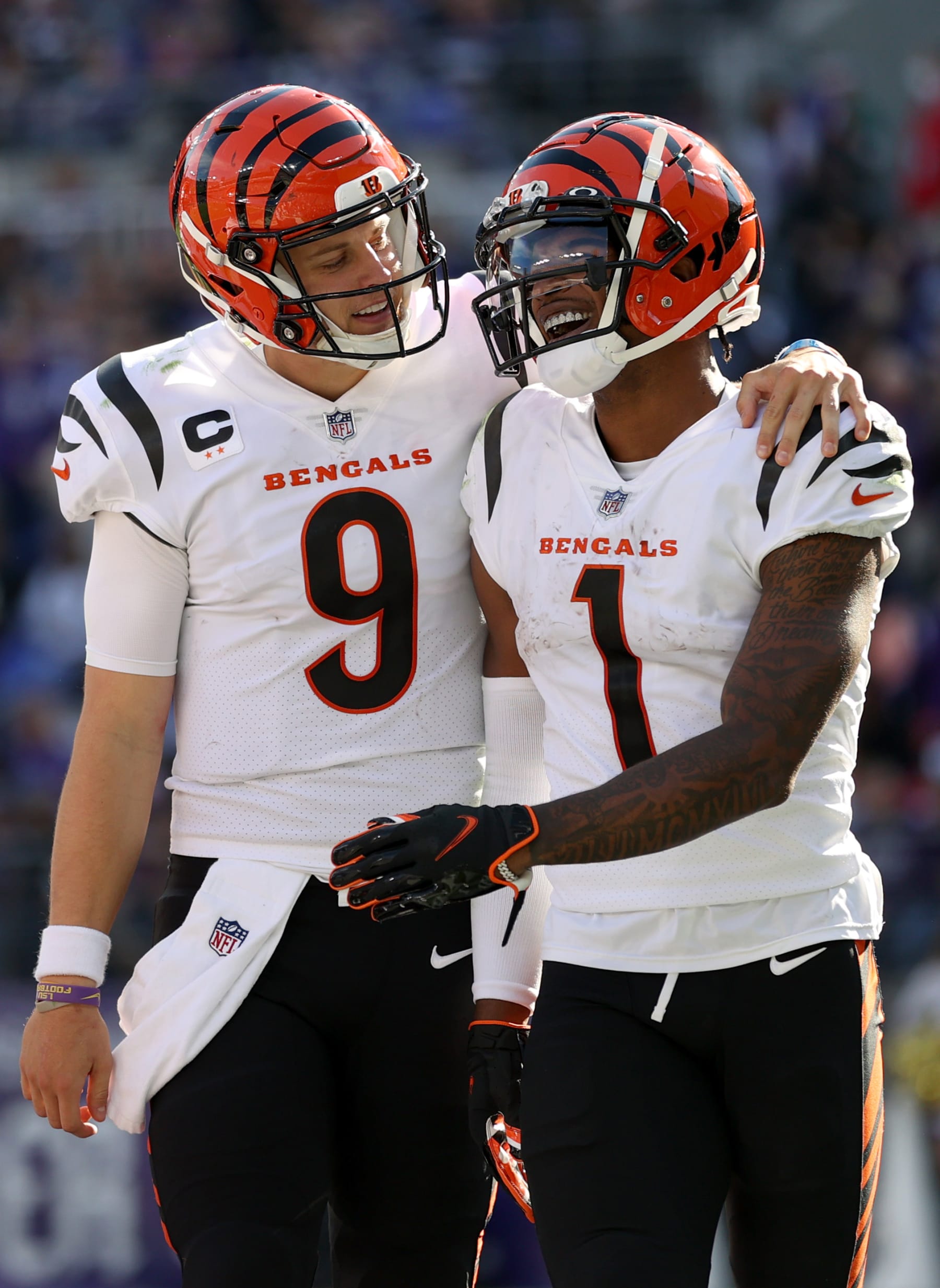 BALTIMORE, MARYLAND - OCTOBER 24: Joe Burrow #9 of the Cincinnati Bengals and Ja'Marr Chase #1 celebrate a touchdown during the second half in the game against the Baltimore Ravens at M&T Bank Stadium on October 24, 2021 in Baltimore, Maryland. (Photo by Rob Carr/Getty Images)