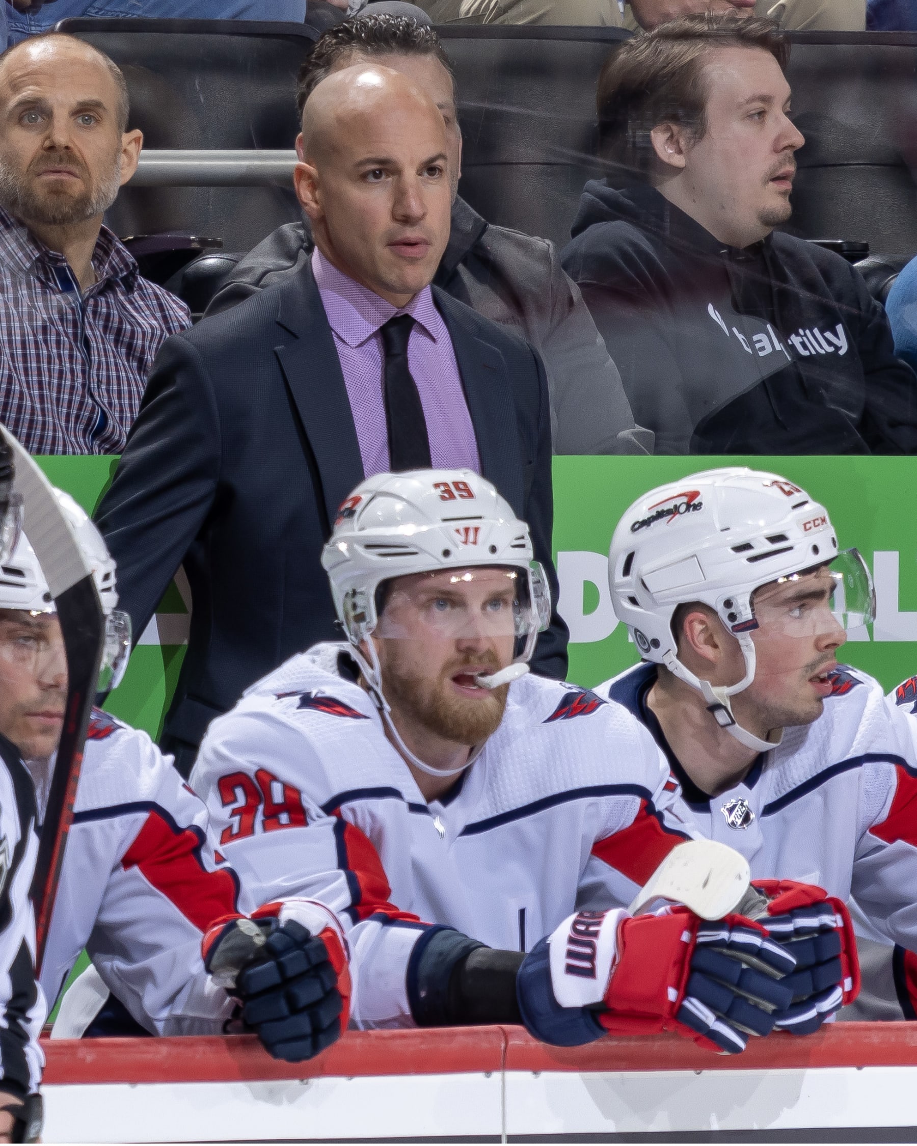 DETROIT, MI - FEBRUARY 27: Head Coach Spencer Carbery of the Washington Capitals looks on during the second period against the Detroit Red Wings at Little Caesars Arena on February 27, 2024 in Detroit, Michigan. Detroit defeated Washington 8-3. (Photo by Dave Reginek/NHLI via Getty Images)