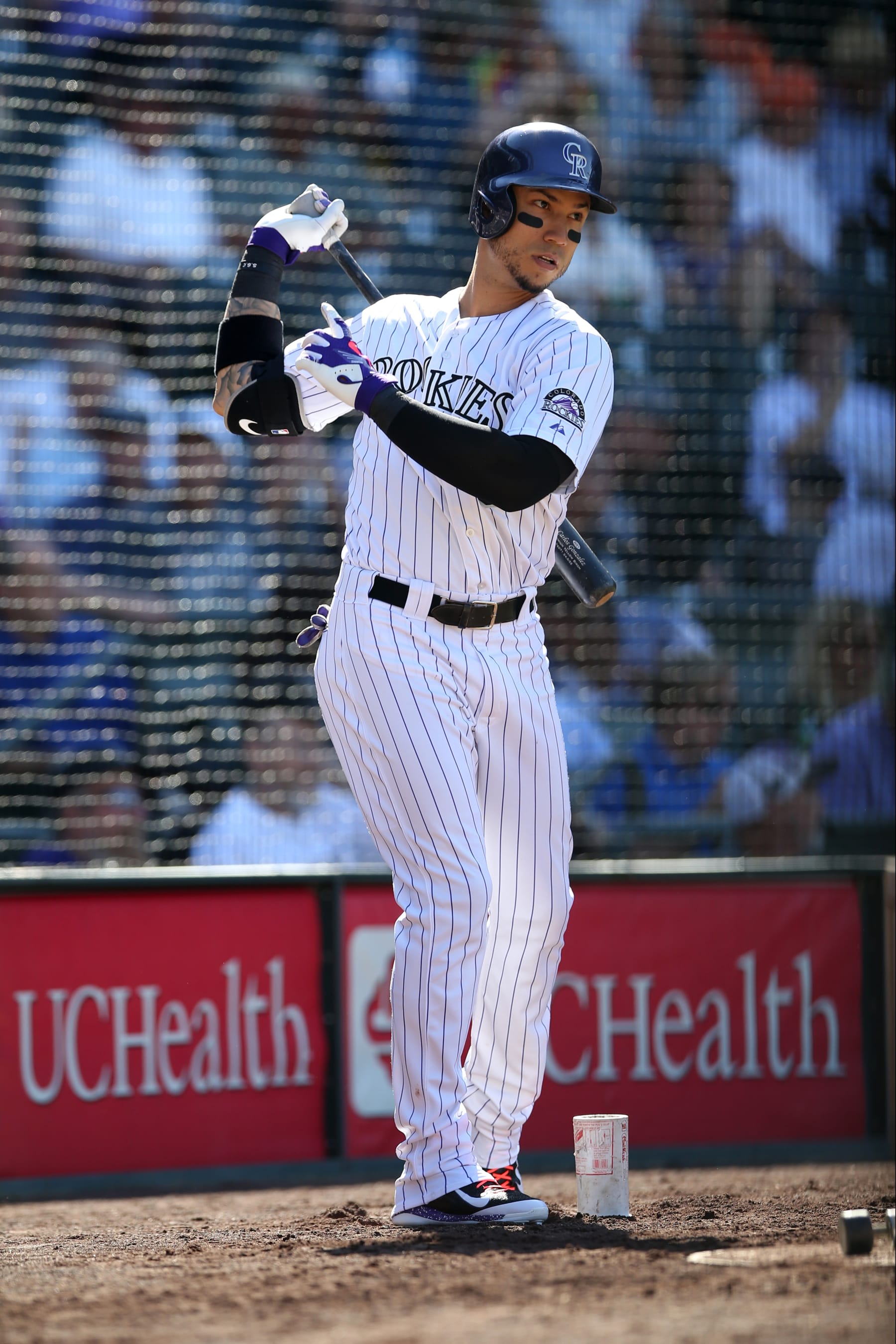 DENVER, CO - SEPTEMBER 24:  Carlos Gonzalez #5 of the Colorado Rockies waits on deck during the game against the Pittsburgh Pirates at Coors Field on September 24, 2015 in Denver, Colorado.  The Pirates defeated the Rockies 5-4.  (Photo by Rob Leiter/MLB Photos via Getty Images)