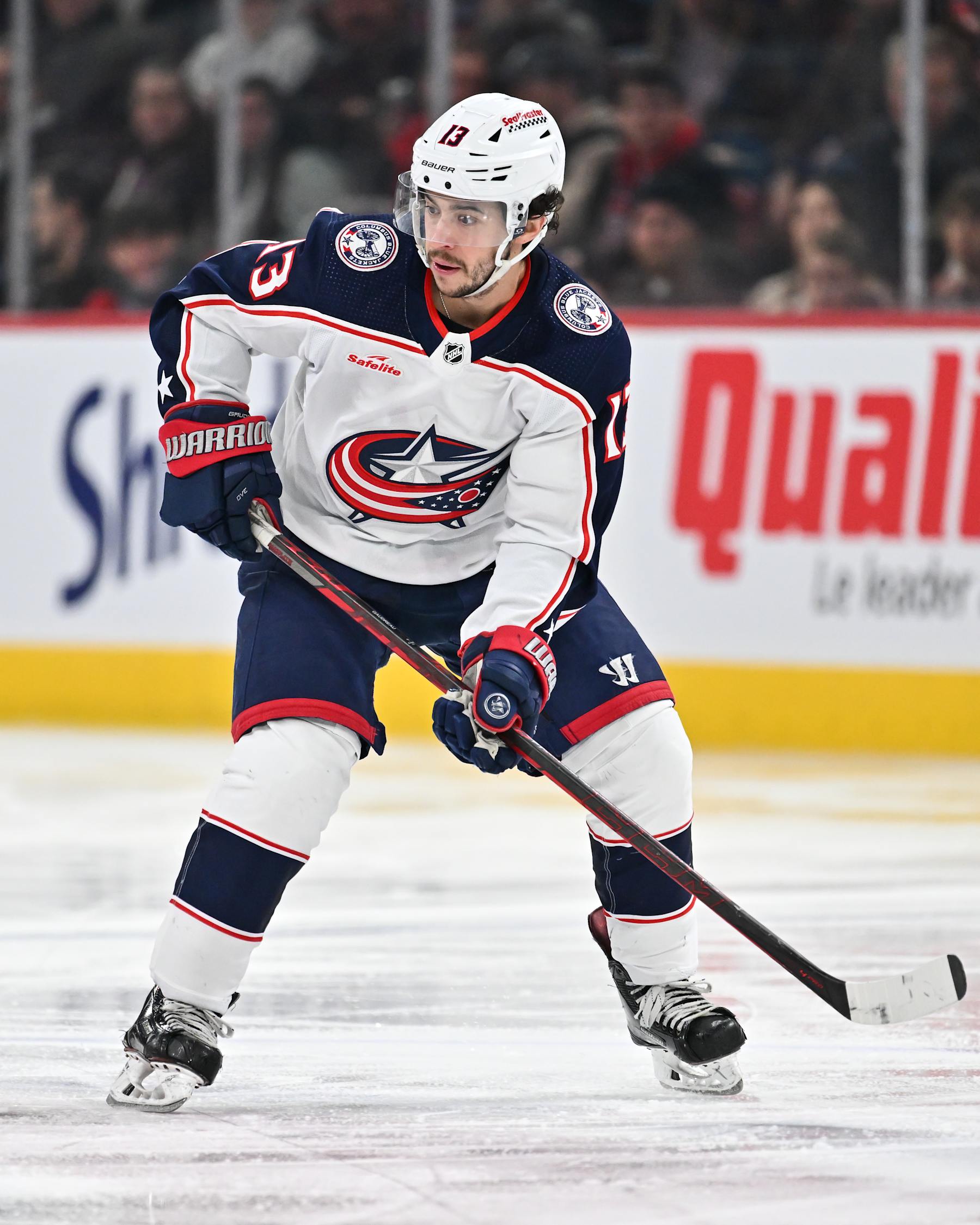 MONTREAL, CANADA - MARCH 12:  Johnny Gaudreau #13 of the Columbus Blue Jackets skates during the third period against the Montreal Canadiens at the Bell Centre on March 12, 2024 in Montreal, Quebec, Canada.  The Montreal Canadiens defeated the Columbus Blue Jackets 3-0. (Photo by Minas Panagiotakis/Getty Images)