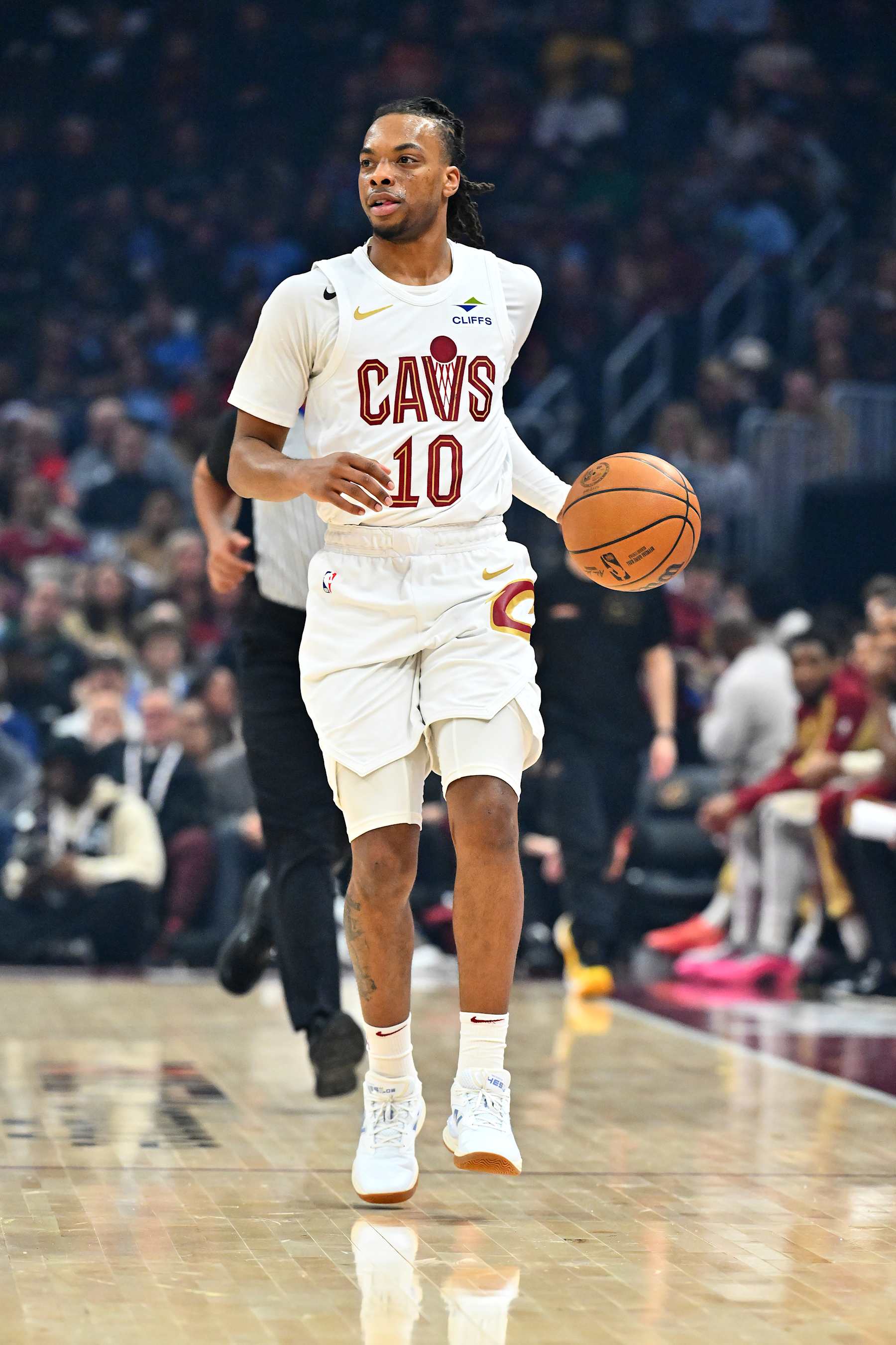 CLEVELAND, OHIO - JANUARY 20: Darius Garland #10 of the Cleveland Cavaliers brings the ball up court during the first quarter against the Phoenix Suns at Rocket Mortgage Fieldhouse on January 20, 2025 in Cleveland, Ohio. NOTE TO USER: User expressly acknowledges and agrees that, by downloading and or using this photograph, User is consenting to the terms and conditions of the Getty Images License Agreement. (Photo by Jason Miller/Getty Images)