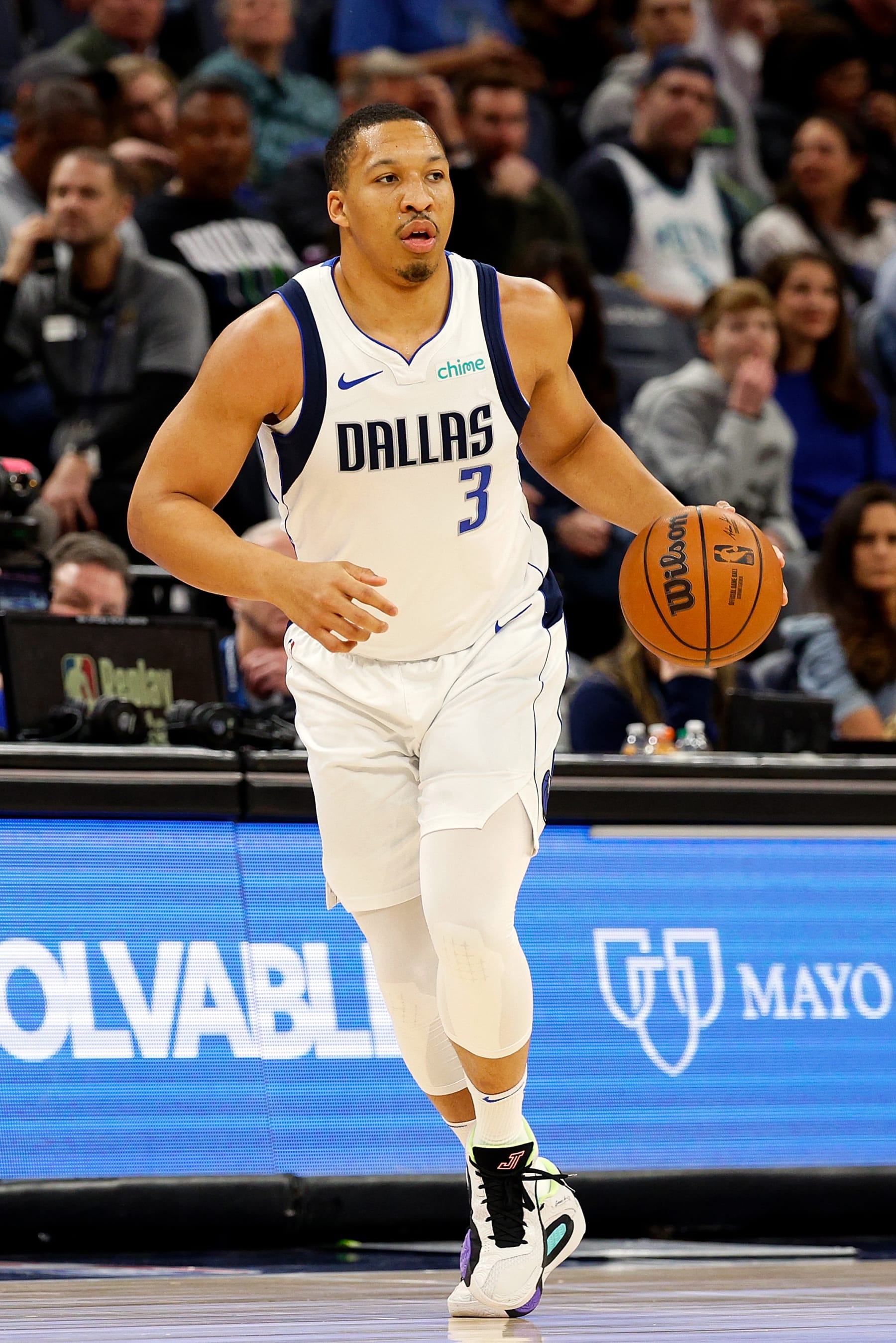 MINNEAPOLIS, MINNESOTA - JANUARY 31: Grant Williams #3 of the Dallas Mavericks dribbles the ball against the Minnesota Timberwolves in the first quarter at Target Center on January 31, 2024 in Minneapolis, Minnesota. The Timberwolves defeated the Mavericks 121-87. NOTE TO USER: User expressly acknowledges and agrees that, by downloading and or using this photograph, User is consenting to the terms and conditions of the Getty Images License Agreement. (Photo by David Berding/Getty Images)