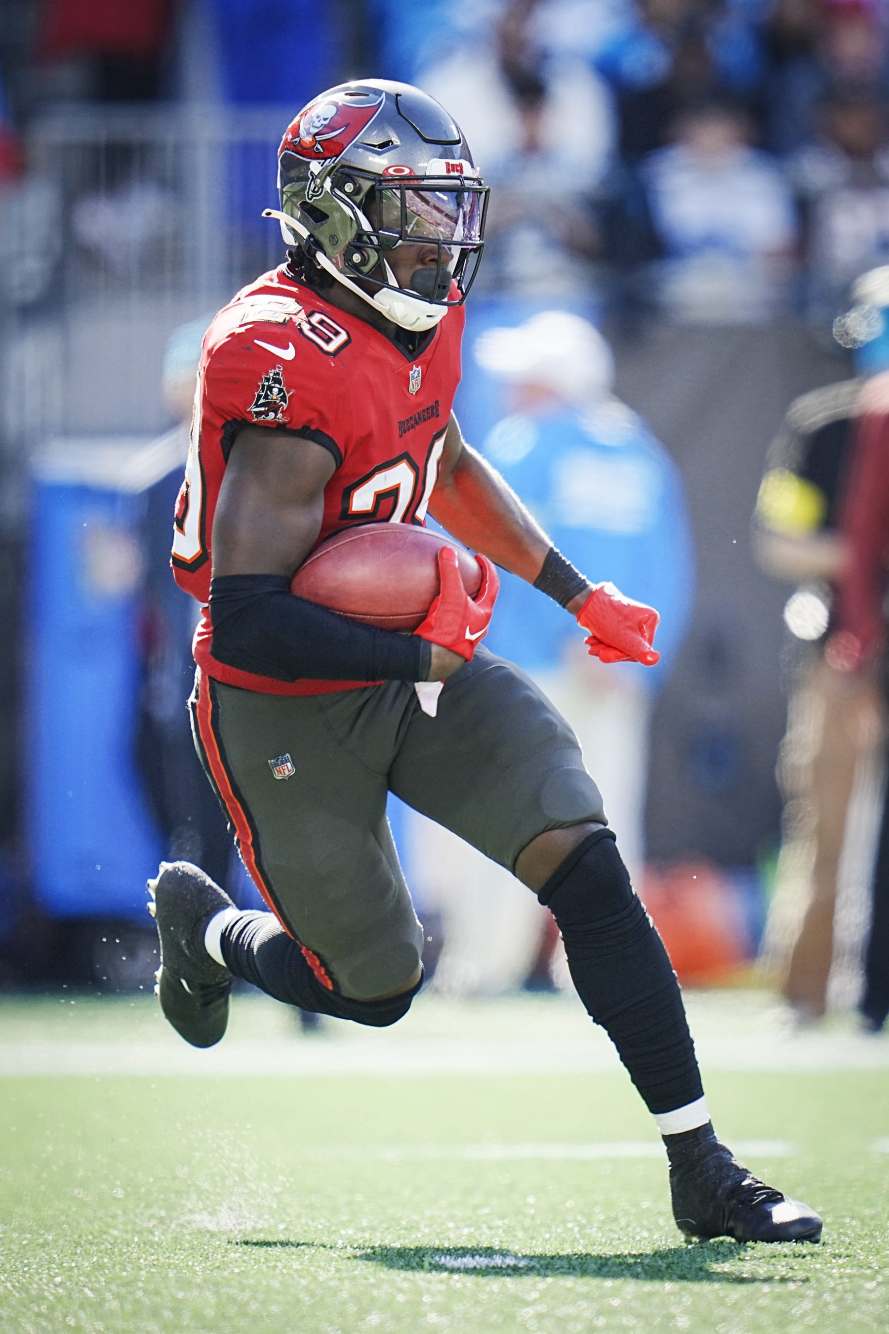 Tampa Bay Buccaneers running back Rachaad White (29) makes a run during an NFL football game against the Carolina Panthers on Sunday, Oct. 23, 2022, in Charlotte, N.C. (AP Photo/Rusty Jones)