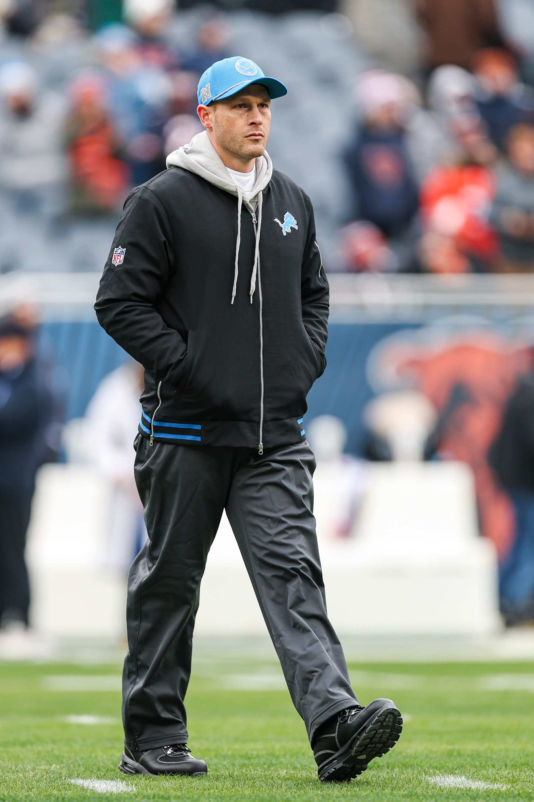 CHICAGO, ILLINOIS - DECEMBER 22: Offensive coordinator Ben Johnson of the Detroit Lions looks on before the game against the Chicago Bears at Soldier Field on December 22, 2024 in Chicago, Illinois. (Photo by Michael Reaves/Getty Images)