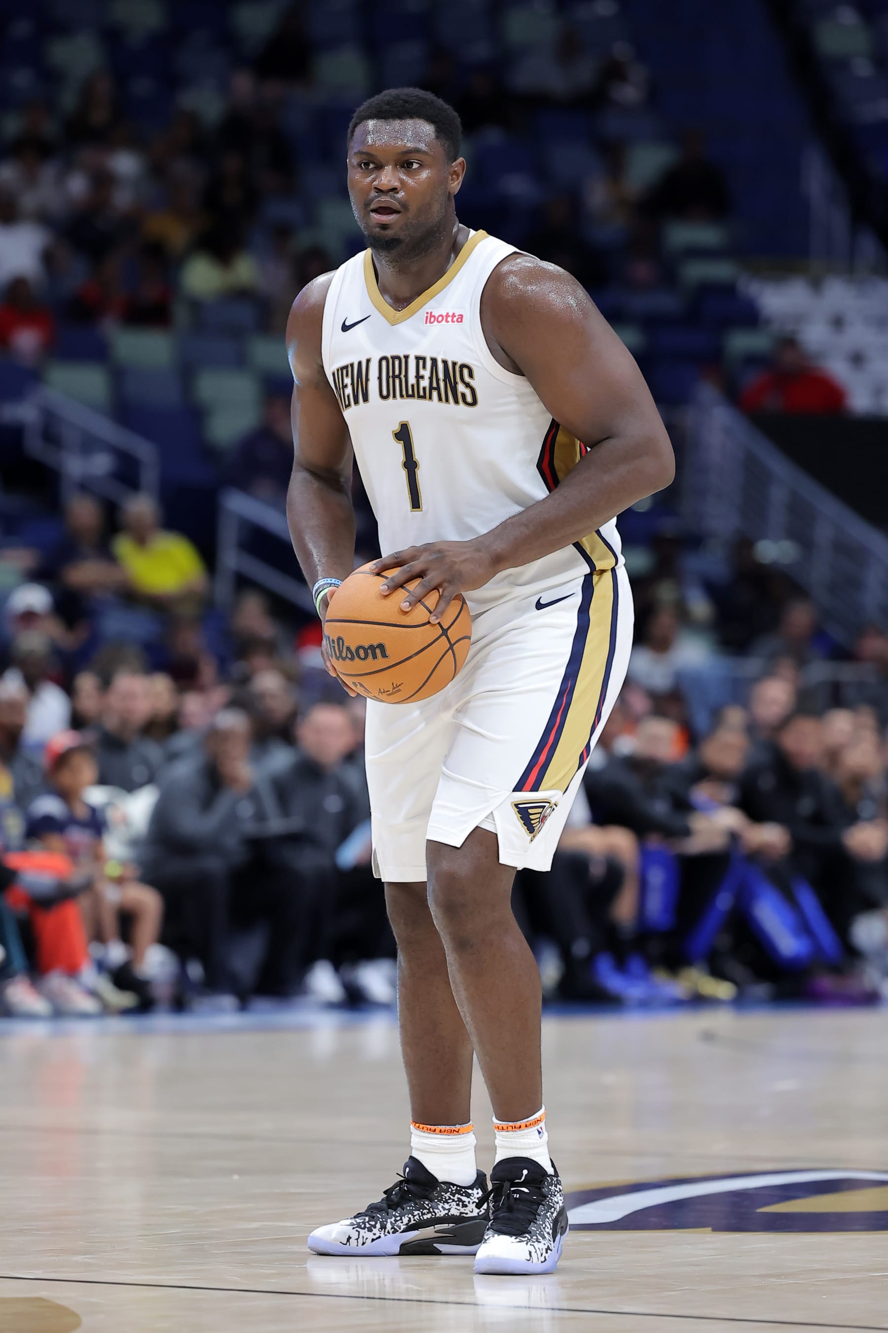 NEW ORLEANS, LOUISIANA - OCTOBER 10: Zion Williamson #1 of the New Orleans Pelicans drives with the ball during the first half of a preseason game against the Orlando Magic at the Smoothie King Center on October 10, 2023 in New Orleans, Louisiana. NOTE TO USER: User expressly acknowledges and agrees that, by downloading and or using this Photograph, user is consenting to the terms and conditions of the Getty Images License Agreement. (Photo by Jonathan Bachman/Getty Images)