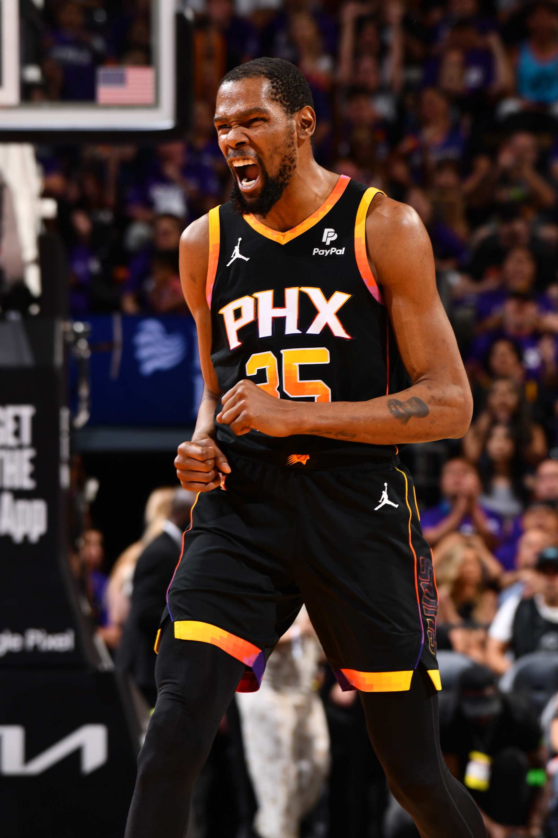 PHOENIX, AZ - APRIL 4: Kevin Durant #35 of the Phoenix Suns celebrates during the game against the Minnesota Timberwolves during Round 1 Game 4 of the 2024 NBA Playoffs on April 4, 2023 at Footprint Center in Phoenix, Arizona. NOTE TO USER: User expressly acknowledges and agrees that, by downloading and or using this photograph, user is consenting to the terms and conditions of the Getty Images License Agreement. Mandatory Copyright Notice: Copyright 2024 NBAE (Photo by Barry Gossage/NBAE via Getty Images)