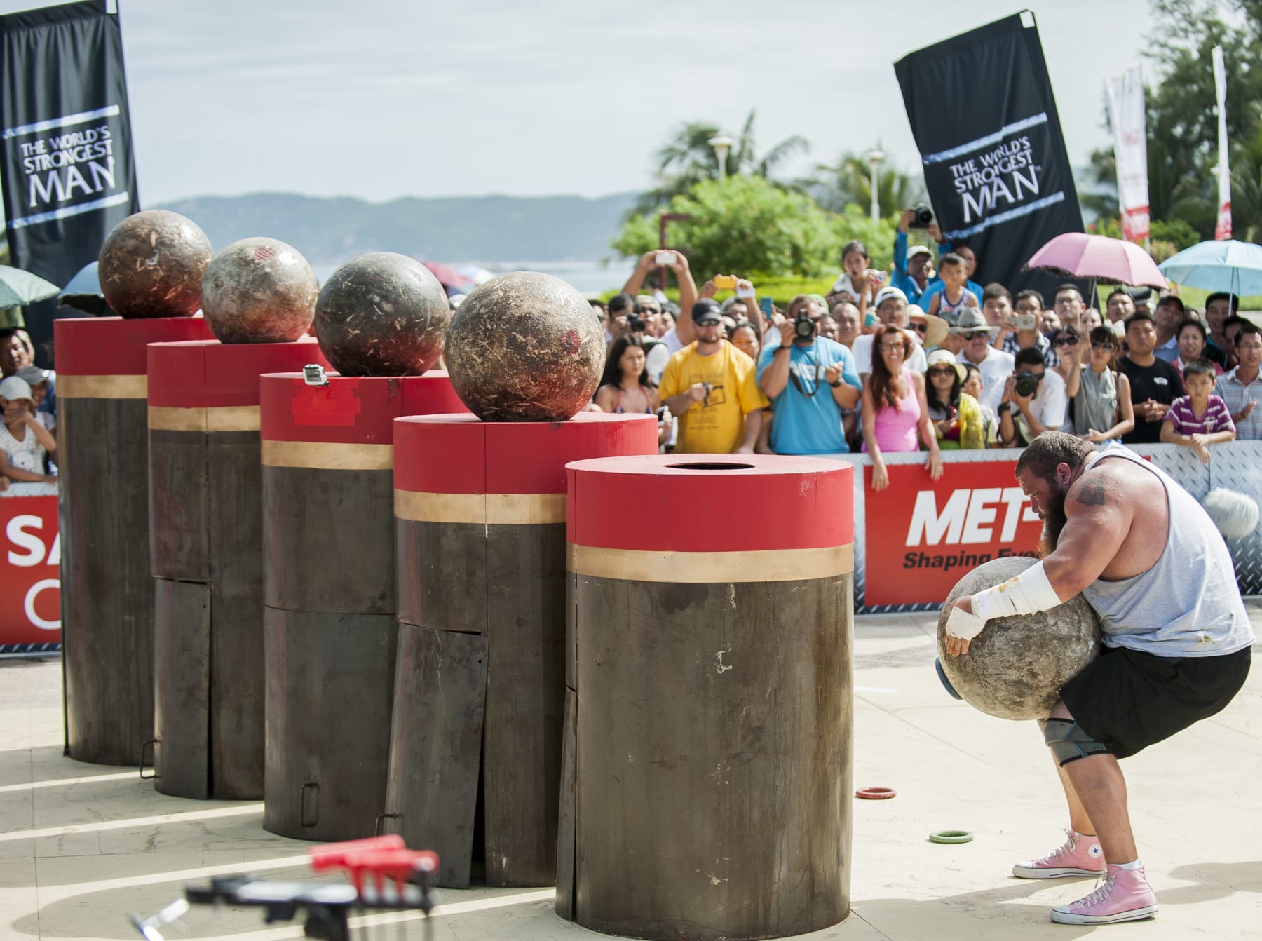 HAINAN ISLAND, CHINA - AUGUST 24:  Robert Oberst of USA competes at the Atlas Stones event during the World's Strongest Man competition at Yalong Bay Cultural Square on August 24, 2013 in Hainan Island, China.  (Photo by Victor Fraile/Getty Images)