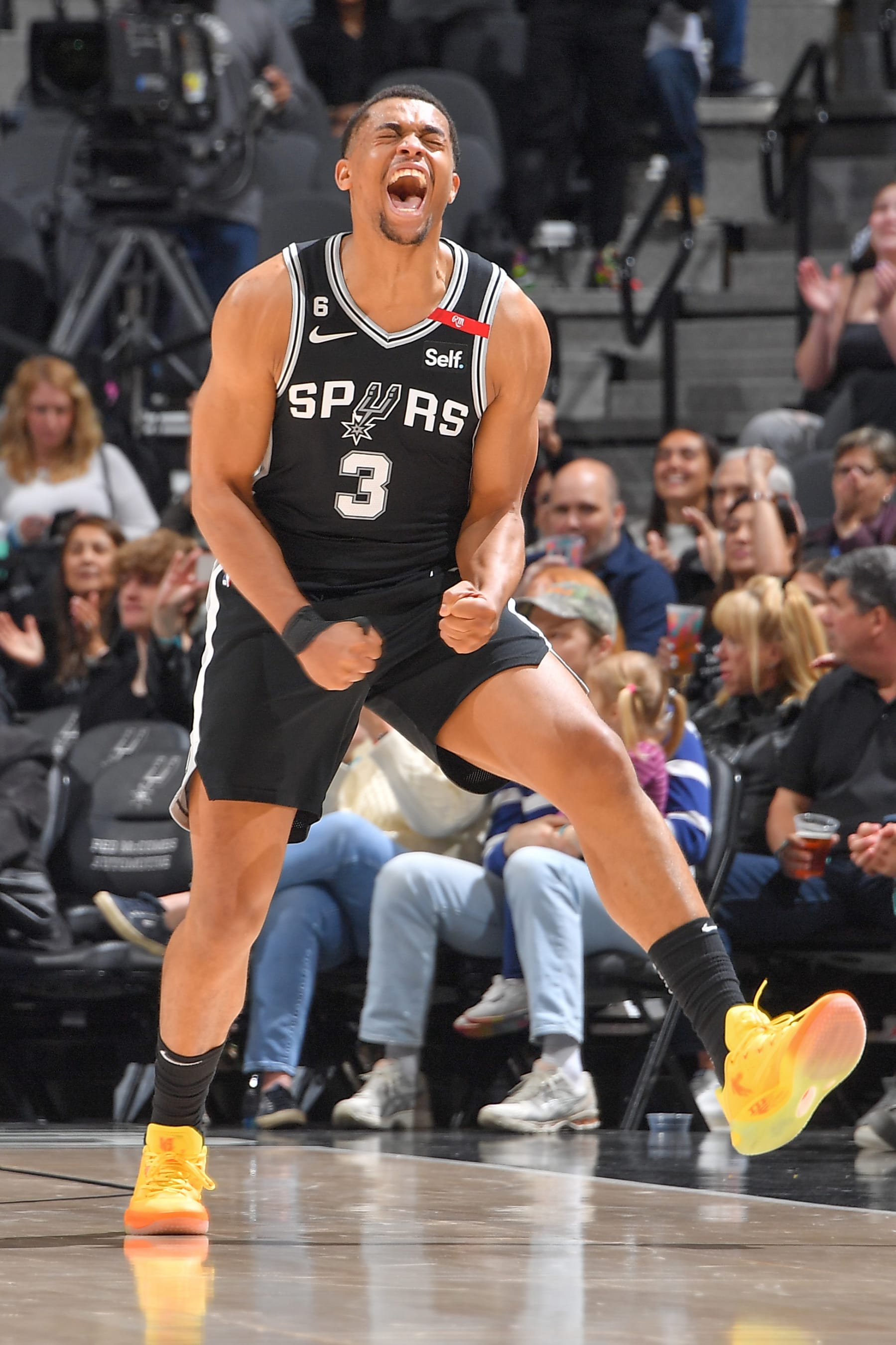 SAN ANTONIO, TX - MARCH19:  Keldon Johnson #3 of the San Antonio Spurs celebrates during the game on March 19, 2023 at the AT&T Center in San Antonio, Texas. NOTE TO USER: User expressly acknowledges and agrees that, by downloading and or using this photograph, user is consenting to the terms and conditions of the Getty Images License Agreement. Mandatory Copyright Notice: Copyright 2023 NBAE (Photos by Michael Gonzales/NBAE via Getty Images)