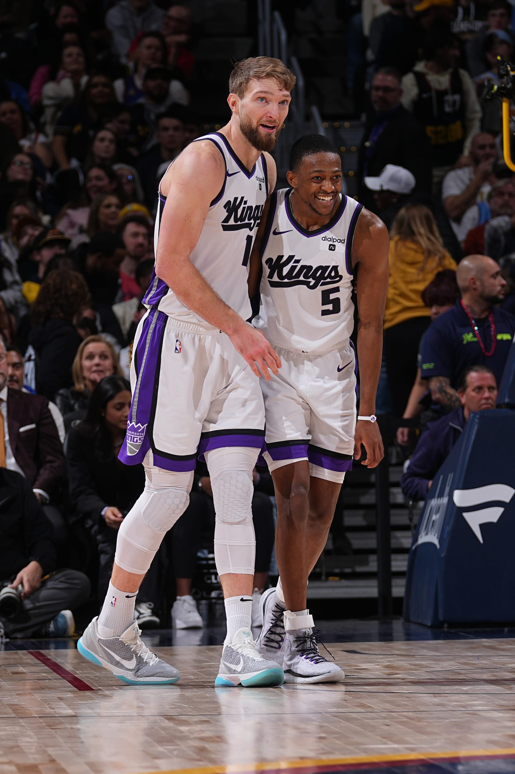 DENVER, CO - FEBRUARY 14: Domantas Sabonis #10 and De'Aaron Fox #5 of the Sacramento Kings celebrate during the game against the Denver Nuggets on February 14, 2024 at the Ball Arena in Denver, Colorado. NOTE TO USER: User expressly acknowledges and agrees that, by downloading and/or using this Photograph, user is consenting to the terms and conditions of the Getty Images License Agreement. Mandatory Copyright Notice: Copyright 2024 NBAE (Photo by Bart Young/NBAE via Getty Images)