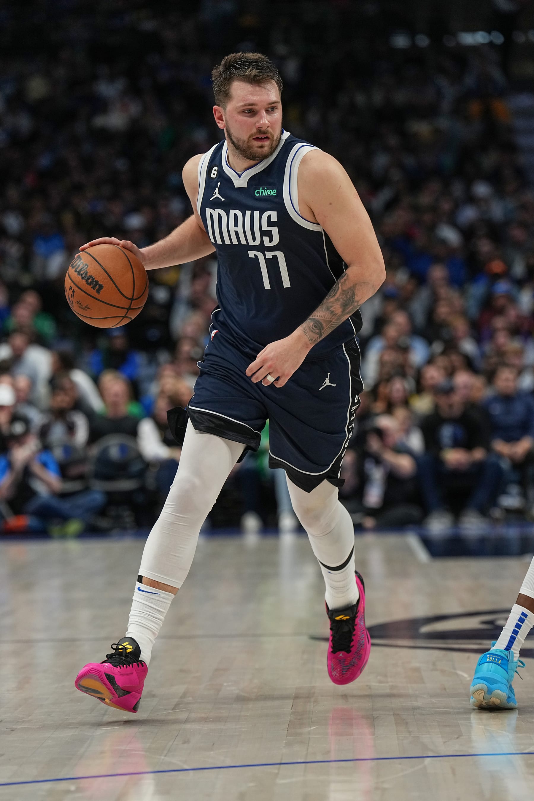 DALLAS, TX - FEBUARY 26:  Luka Doncic #77 of the Dallas Mavericks handles the ball during the game  on Febuary 26, 2023 at the American Airlines Center in Dallas, Texas. NOTE TO USER: User expressly acknowledges and agrees that, by downloading and or using this photograph, User is consenting to the terms and conditions of the Getty Images License Agreement. Mandatory Copyright Notice: Copyright 2023 NBAE (Photo by Glenn James/NBAE via Getty Images)